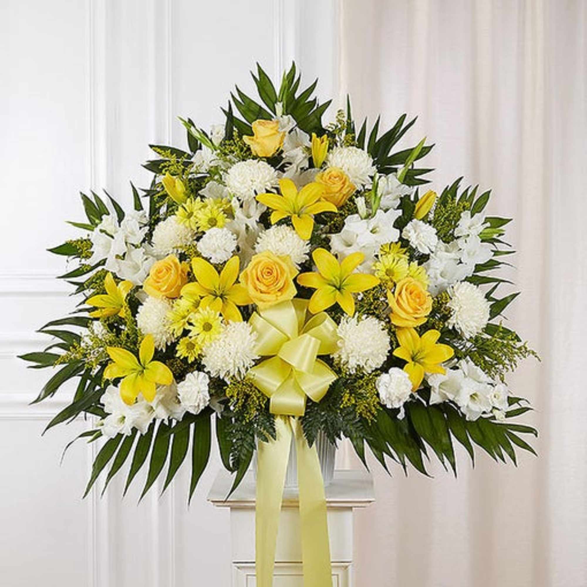 Yellow and white floral standing spray with a ribbon bow, photo 2 of 3