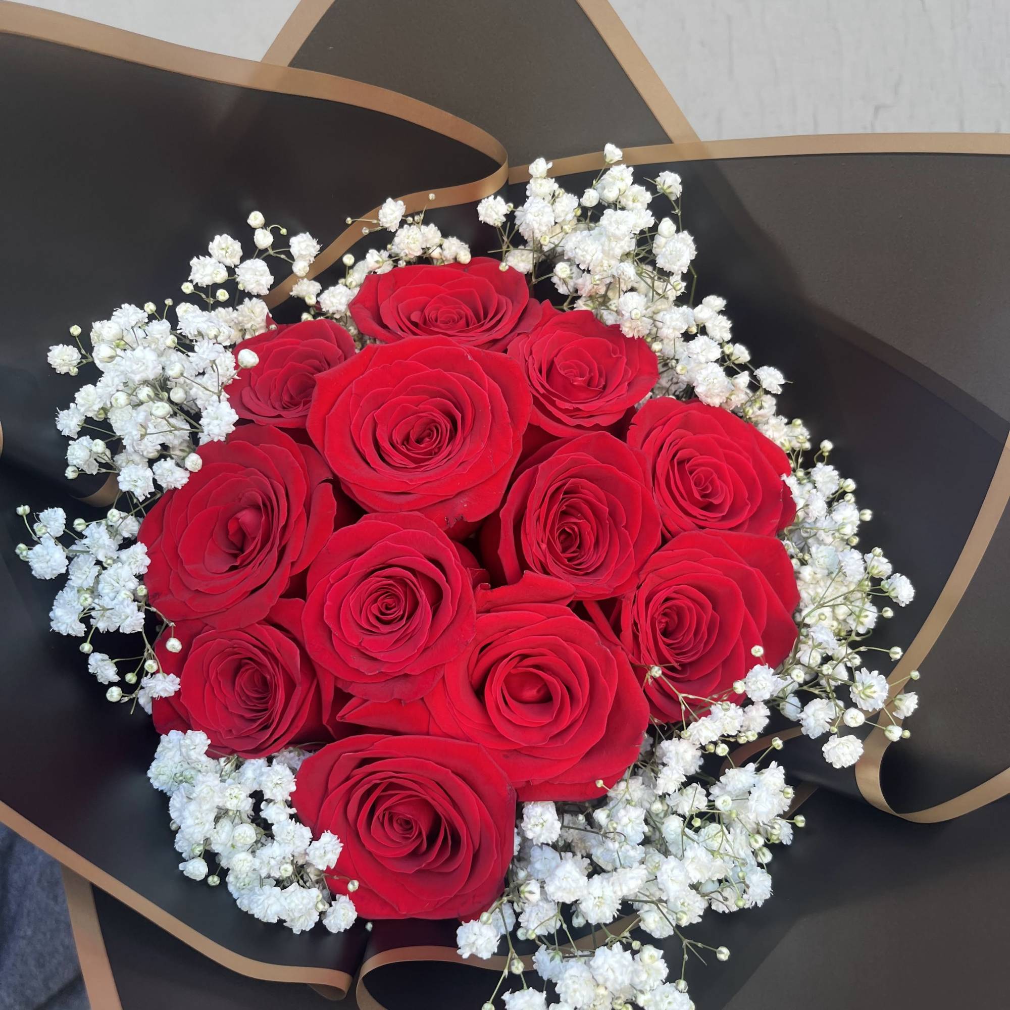 A special red roses bouquet for Valentine's. Created with 12, 24 or