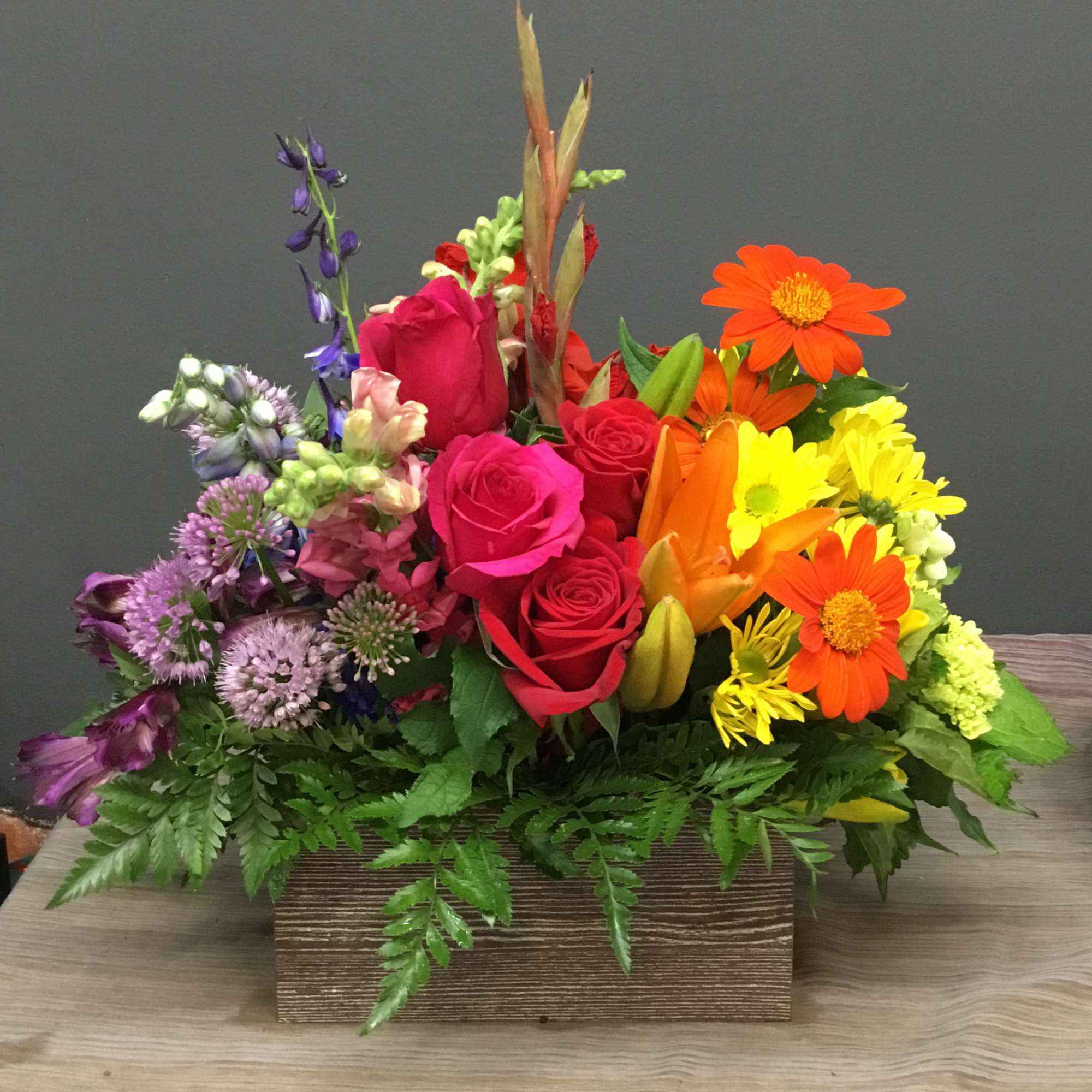 Colorful mixed flower arrangement in a wooden box, photo 2 of 2
