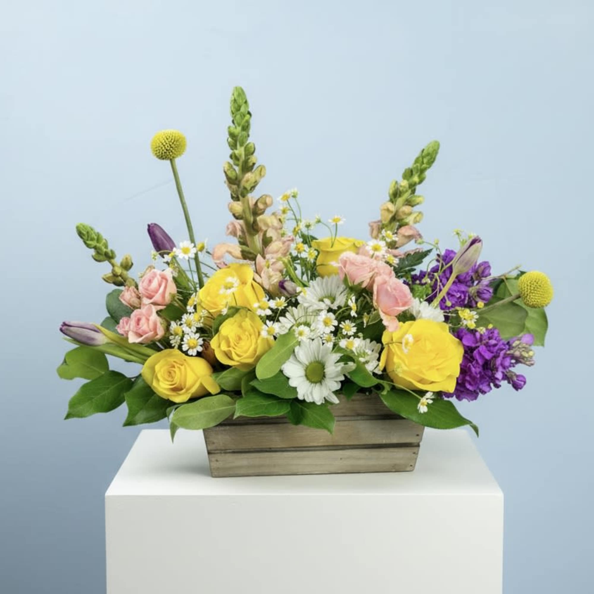 Take a stroll through a country flower garden with this lovely arrangement