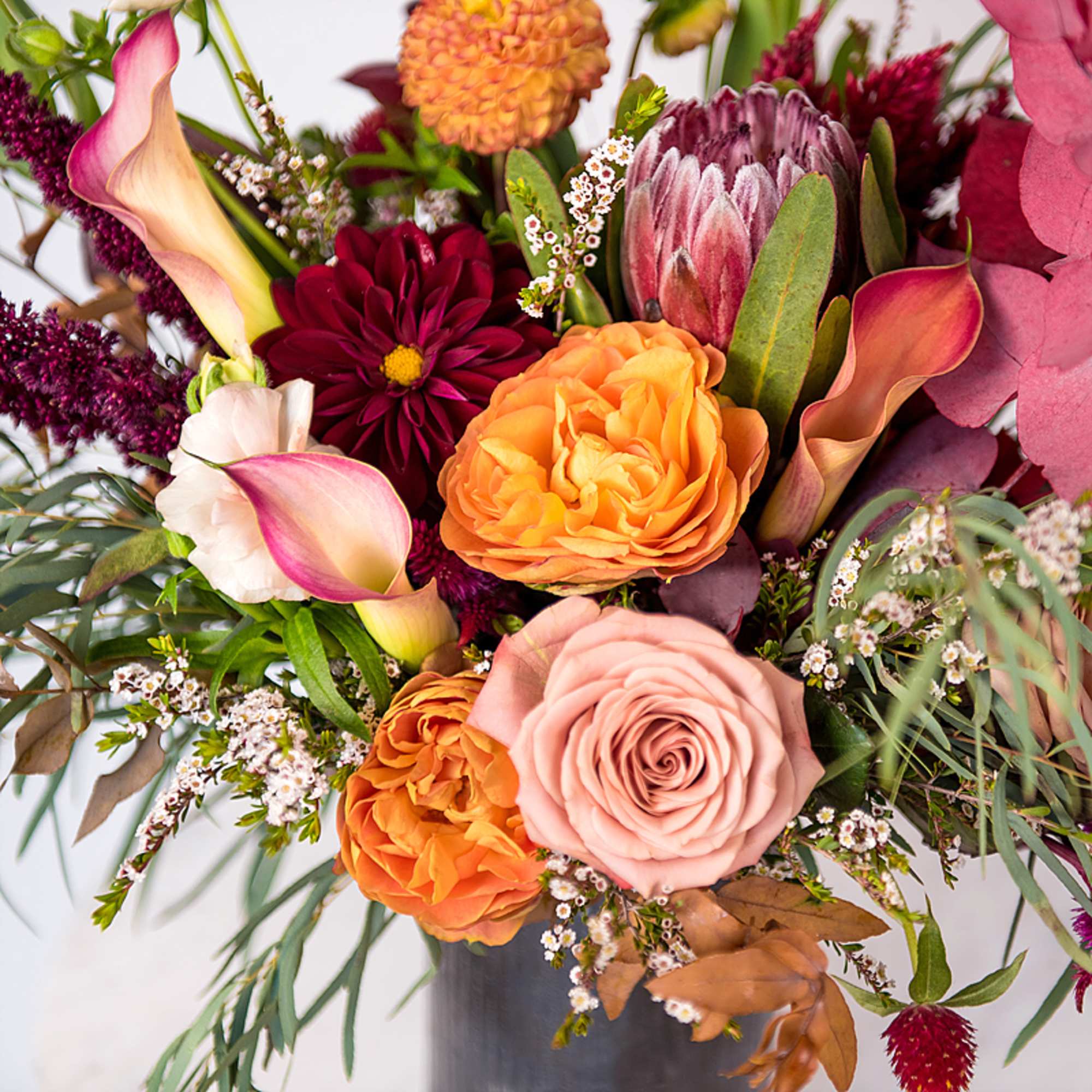 Bring the beauty of fall indoors with this seasonal floral arrangement featuring, photo 2 of 3