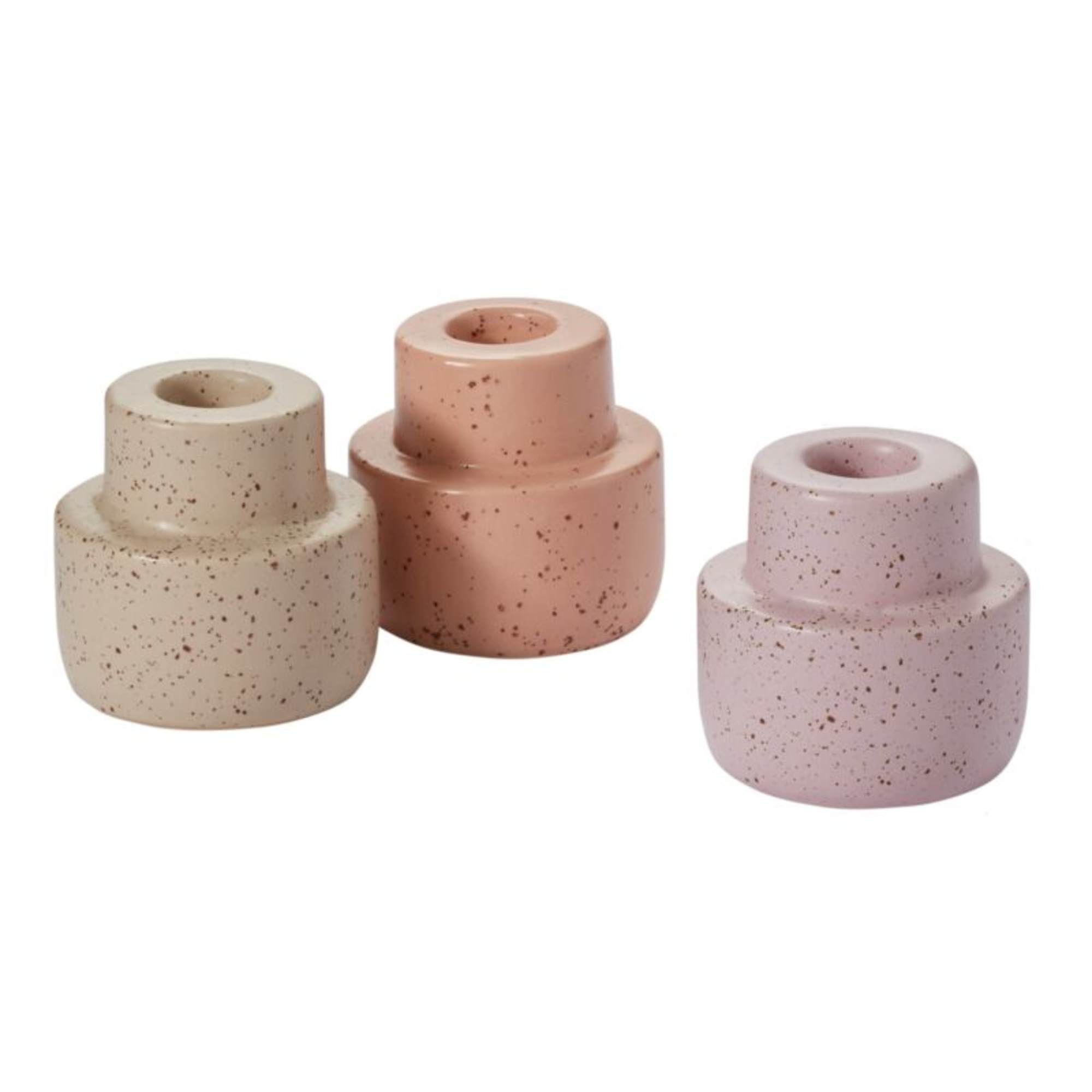 Set of three speckled pastel ceramic bud vases in cream, peach, and lavender tones.