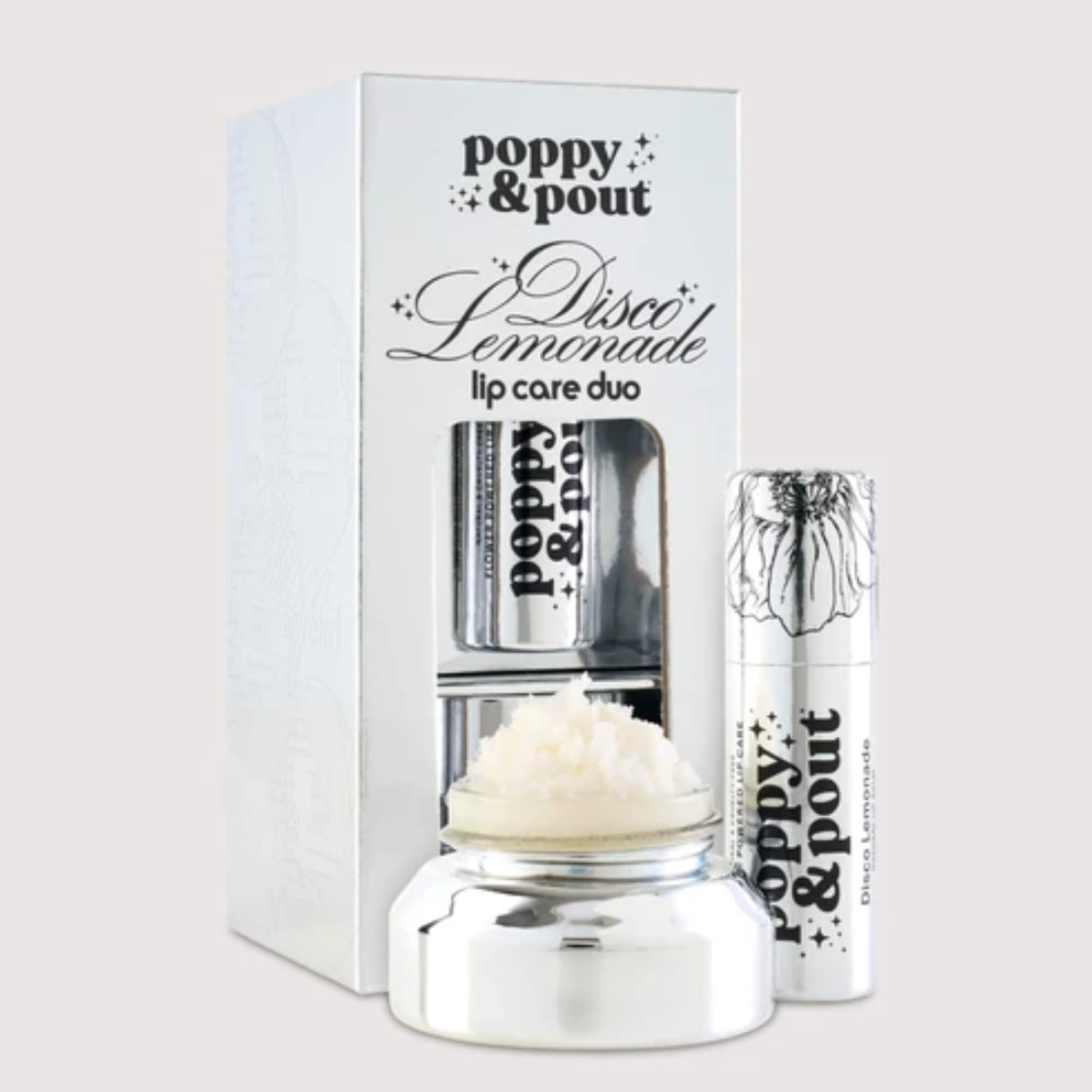 Lip care duo in a white box with a silver balm jar and tube