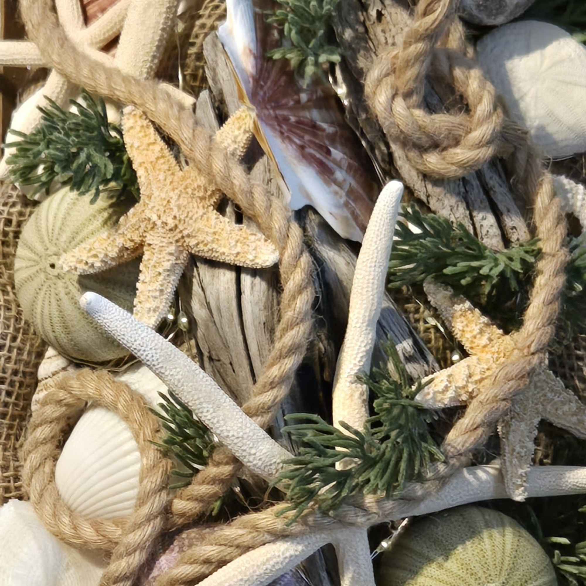 Seashell and starfish wreath with rope and driftwood accents