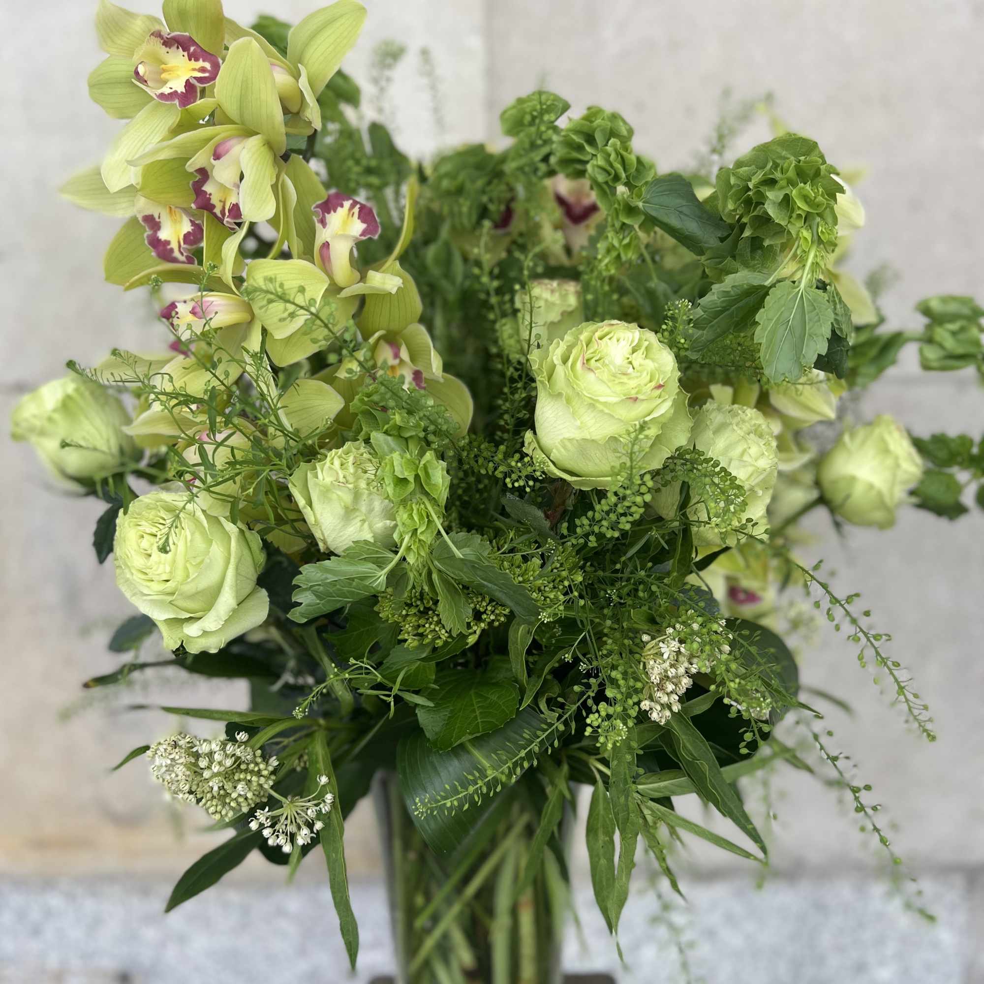 TALL LUSH ARRANGMENT CYMBIDIUM ORCHID, MINI GREEN HYDRANGEAS, BELLS OF IRELAND, ASCLEPIA, photo 2 of 7
