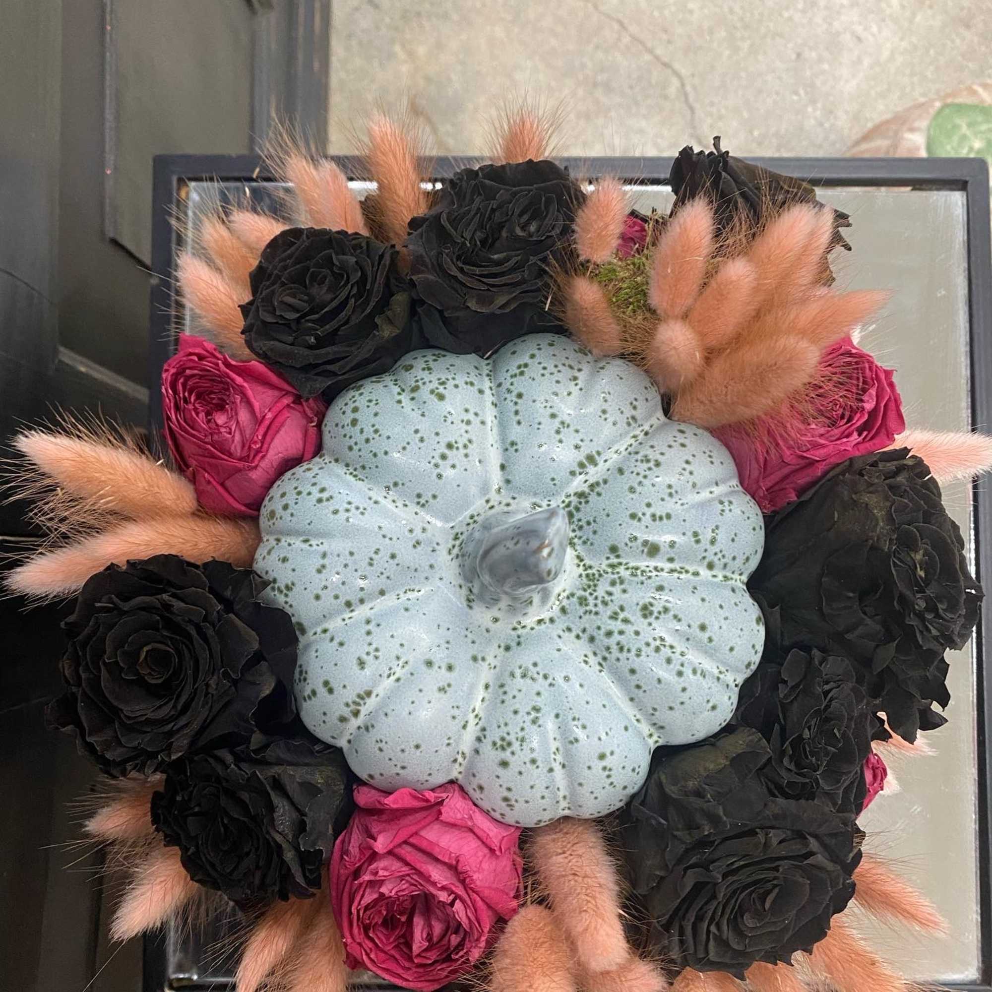 An enchanting ceramic pumpkin beautifully arranged with preserved black roses, mauve garden, photo 2 of 2