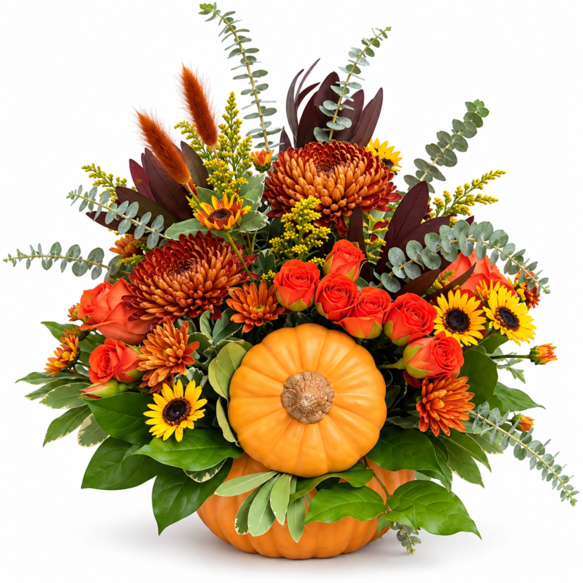 Fall floral arrangement with pumpkins, orange roses, chrysanthemums, and sunflowers