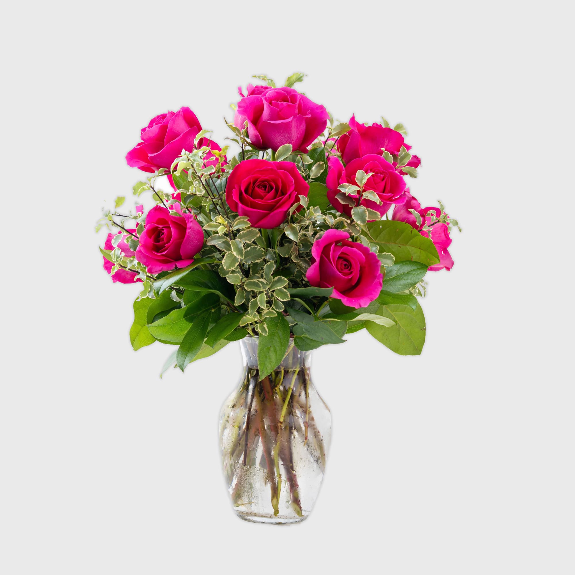 One dozen long stemmed pink roses.