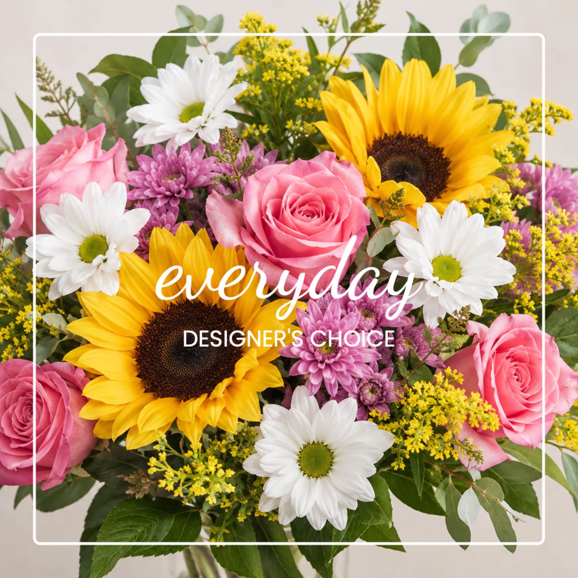 Mixed bouquet with pink roses, sunflowers, and white daisies