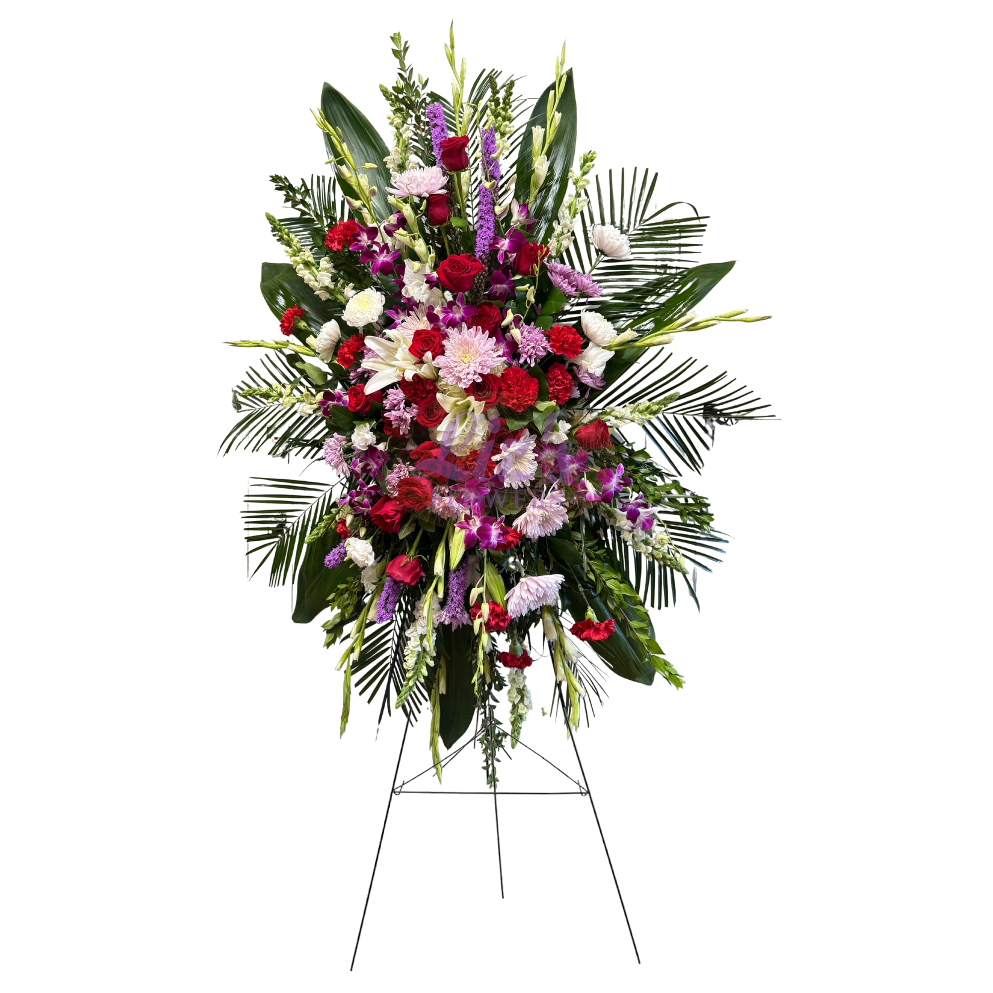 Standing spray in shades of lavender and reds