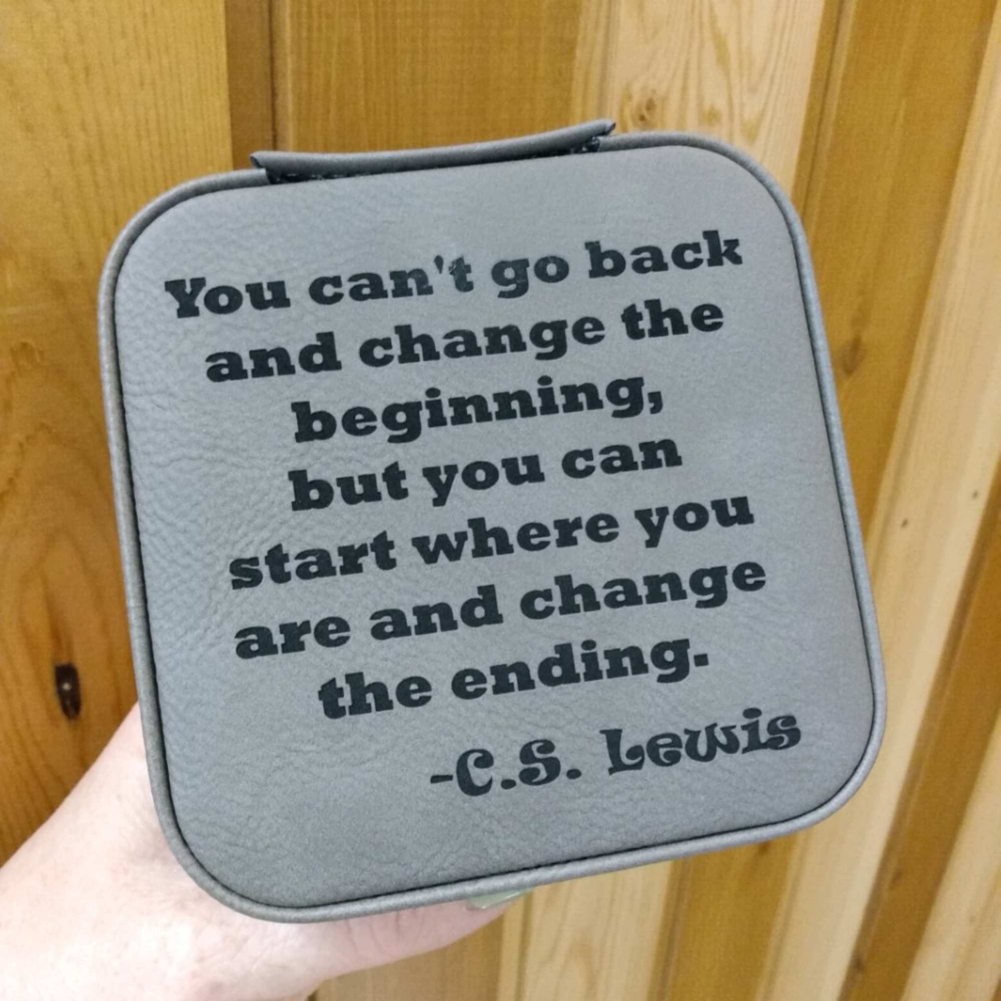 Gray zippered pouch with a C.S. Lewis quote