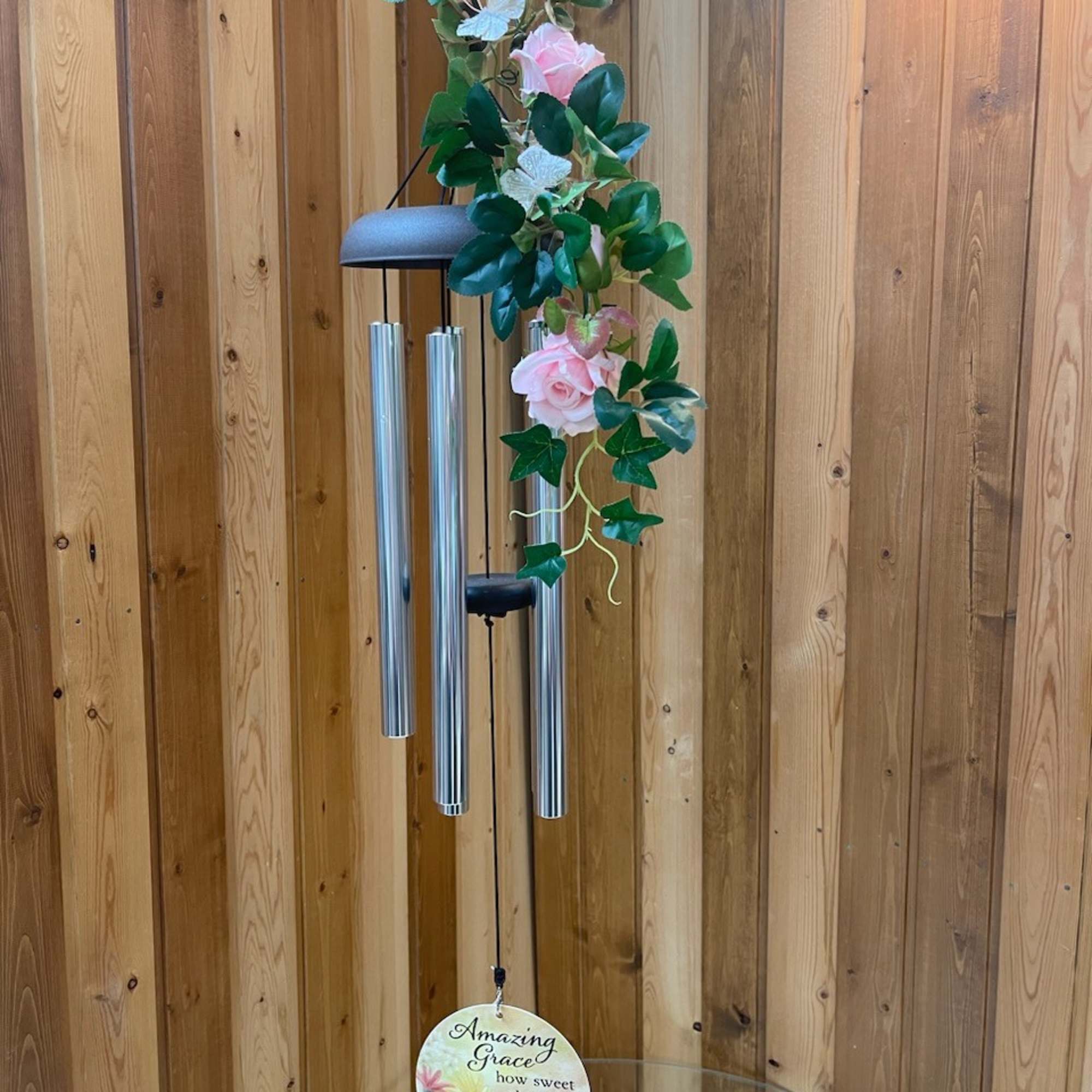 Hanging wind chime with pink roses and green vine accents