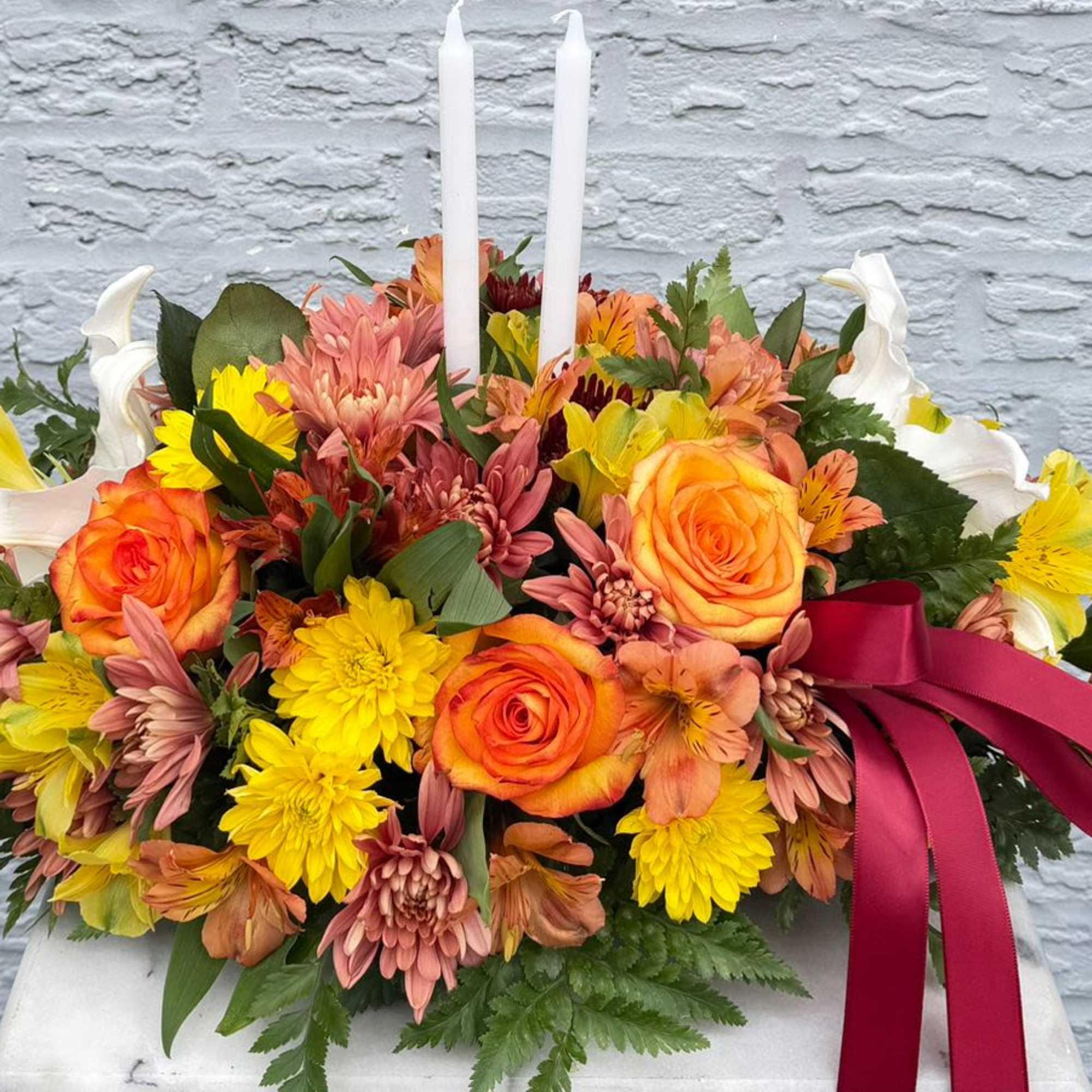 &ldquo;This stunning centerpiece is handcrafted with fresh flowers and accented with an, photo 2 of 3