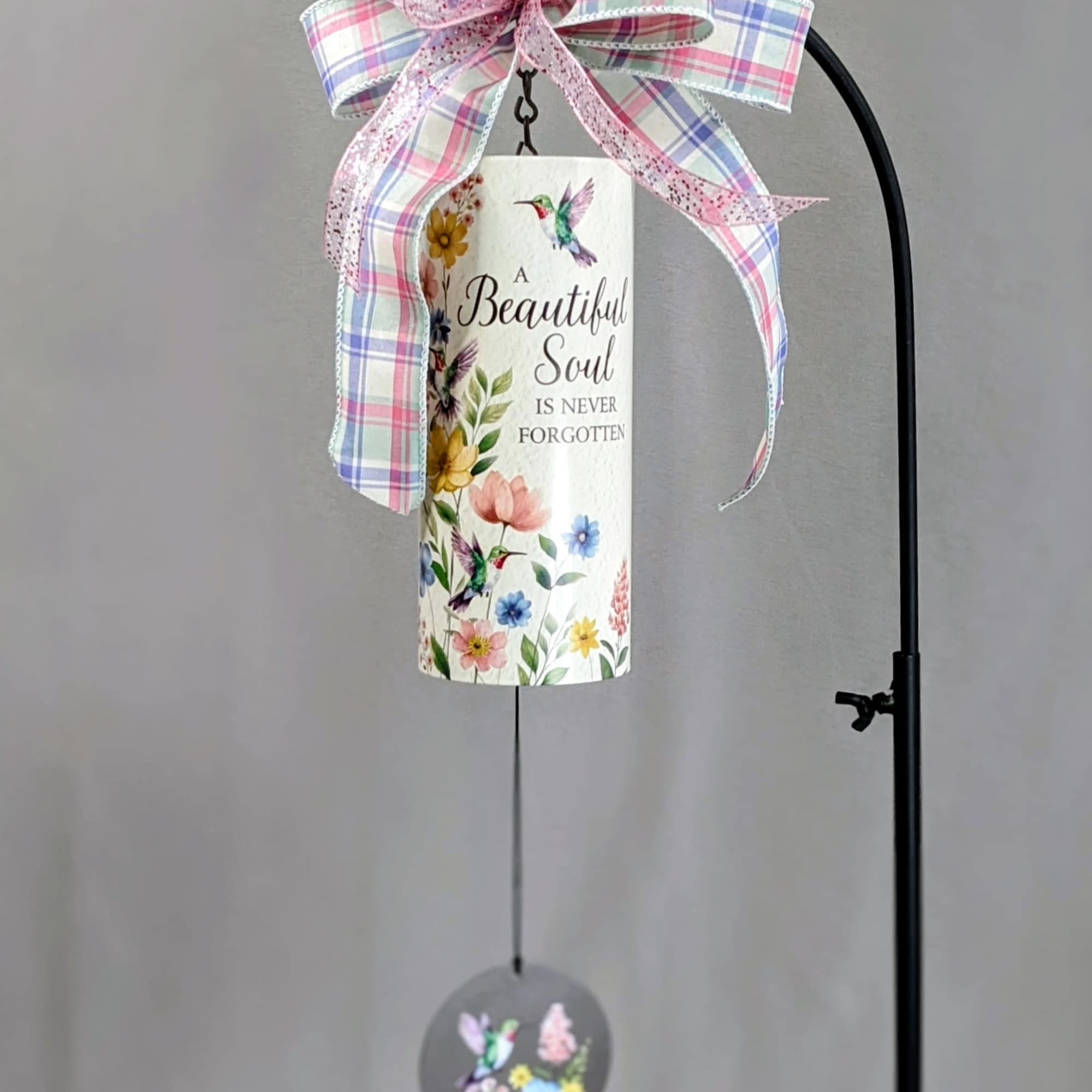 Decorative memorial wind chime with plaid bow and floral print