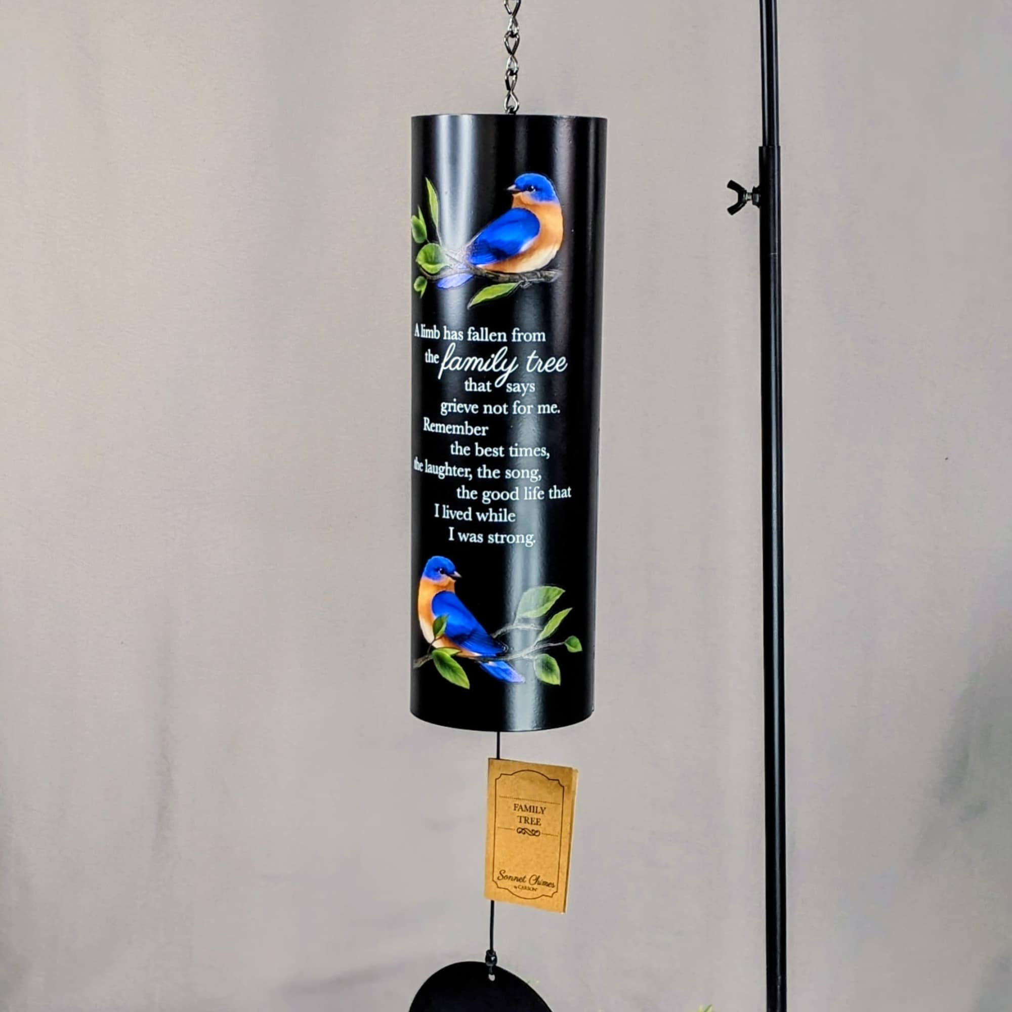 Black hanging memorial wind chime with blue bird artwork and text