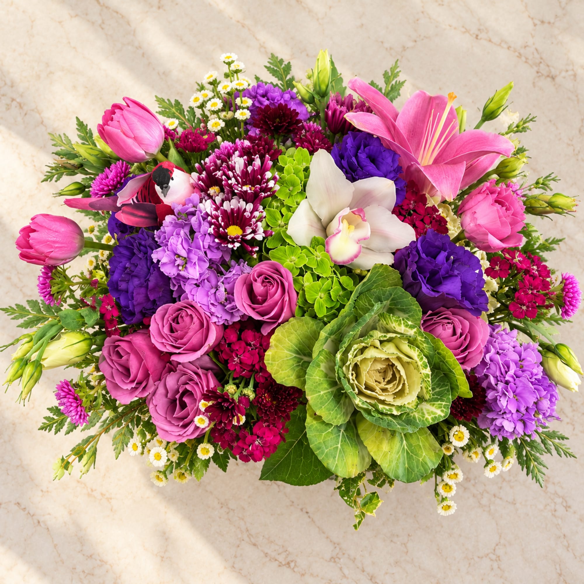 Colorful mixed bouquet with pink lilies, roses, and purple blooms