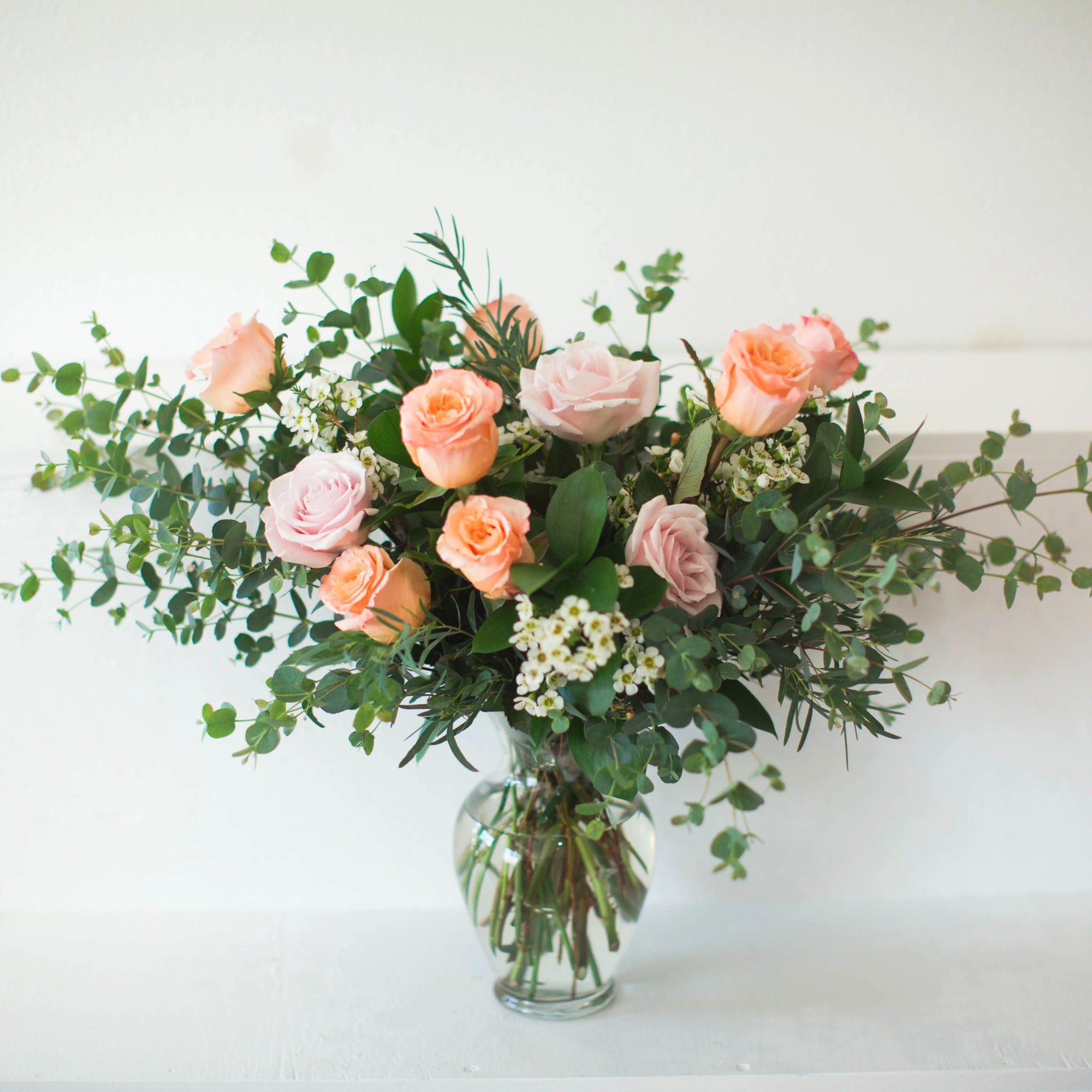 Balboa Blush is a romantic garden-inspired arrangement featuring soft peach and blush