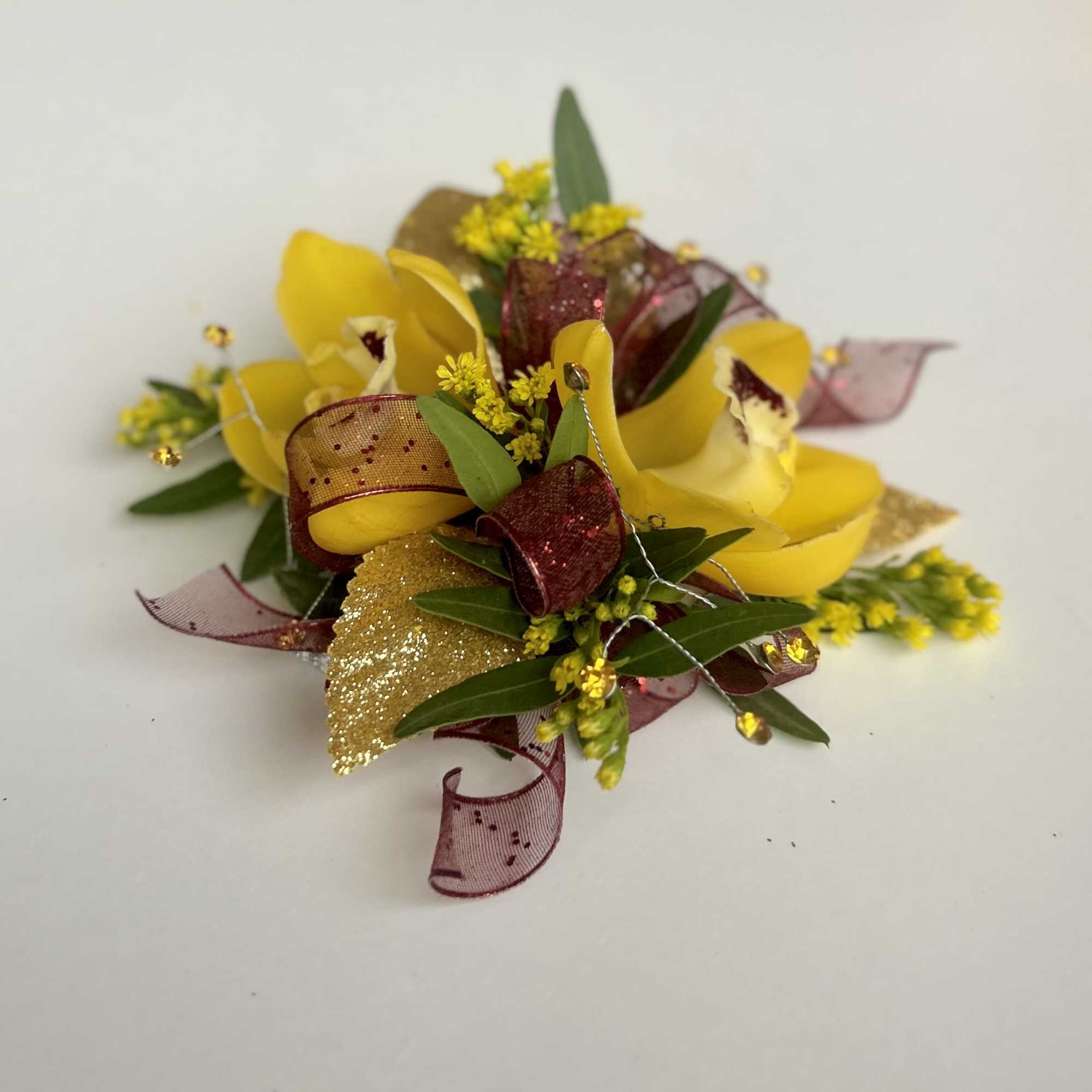 A beautiful Mini Cymbidium Orchid Corsage for Prom or Homecoming girls. 