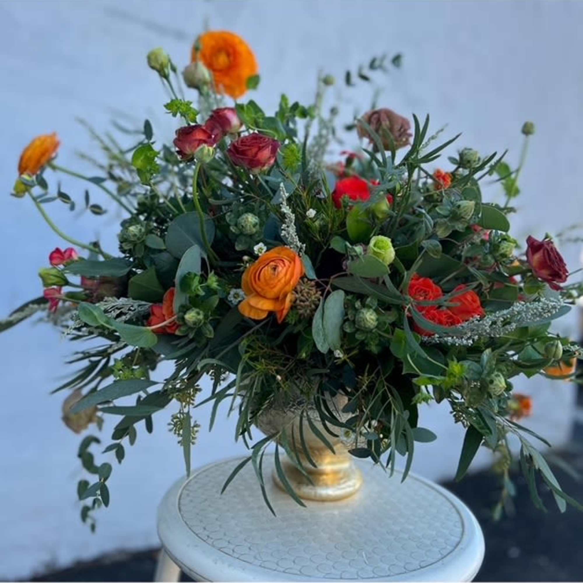 Bring nature's vibrant hues to life with our Vibrant Sunset Garden Centerpiece, photo 2 of 2