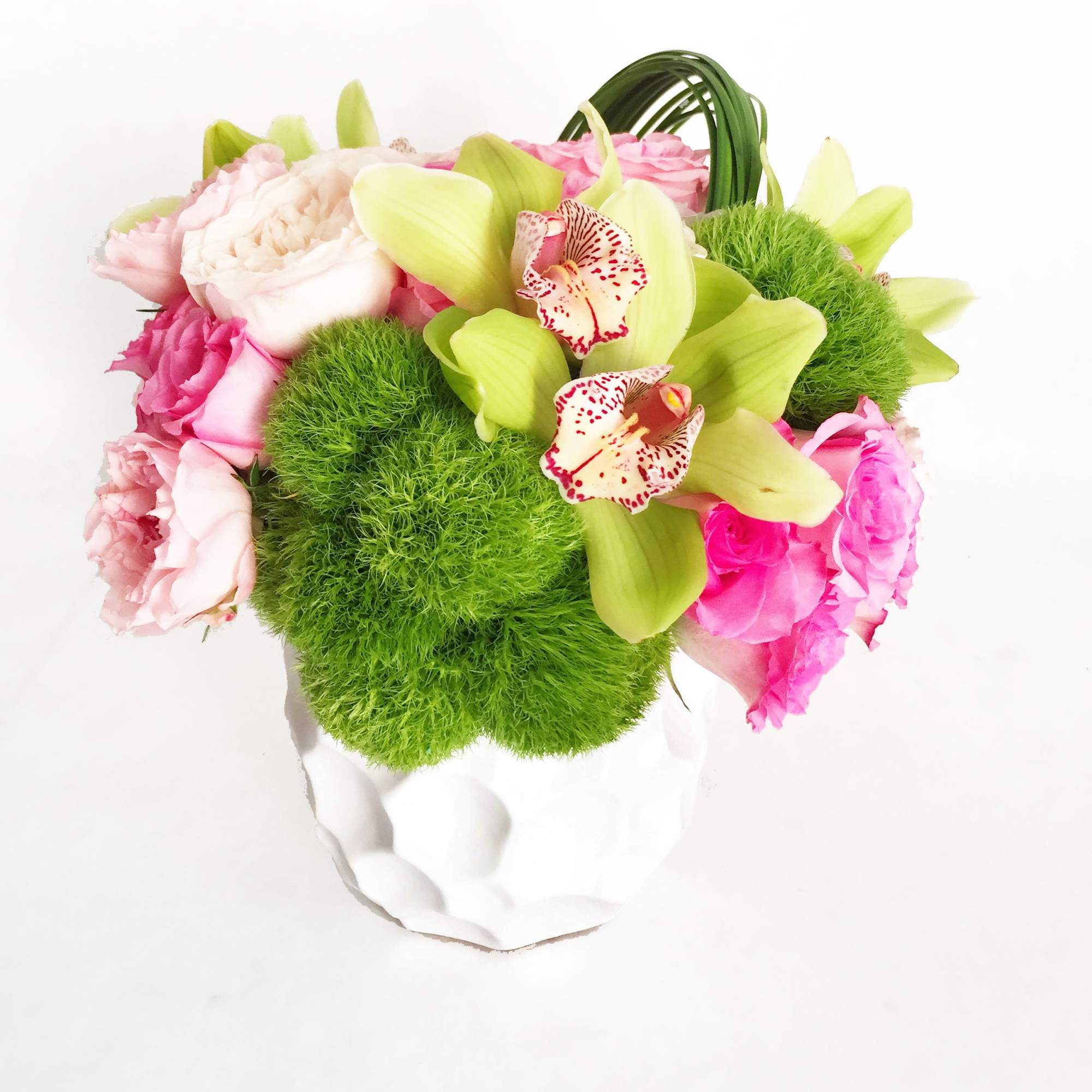 Shades of blush and pink Roses, Garden Roses, and Spray Roses. Paired