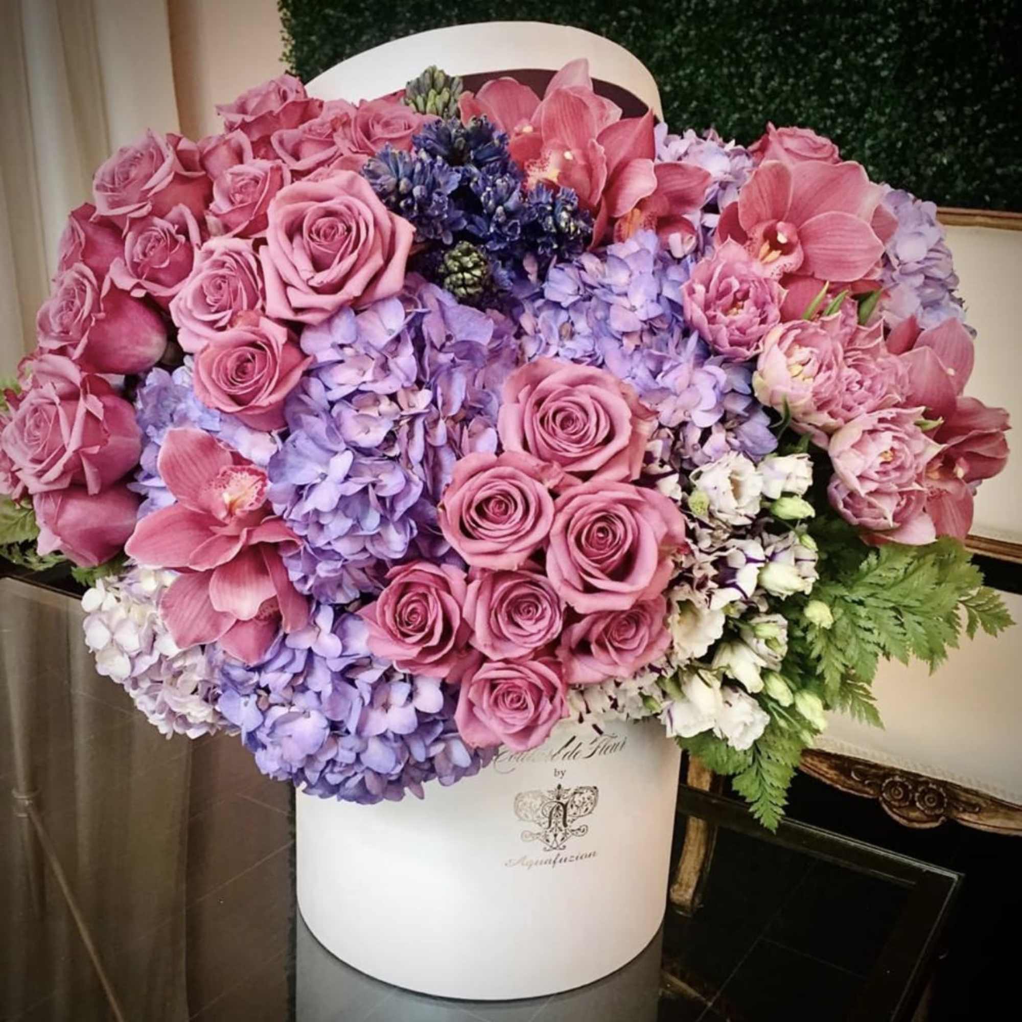 Large pink and lavender floral arrangement in a white hatbox, photo 2 of 3