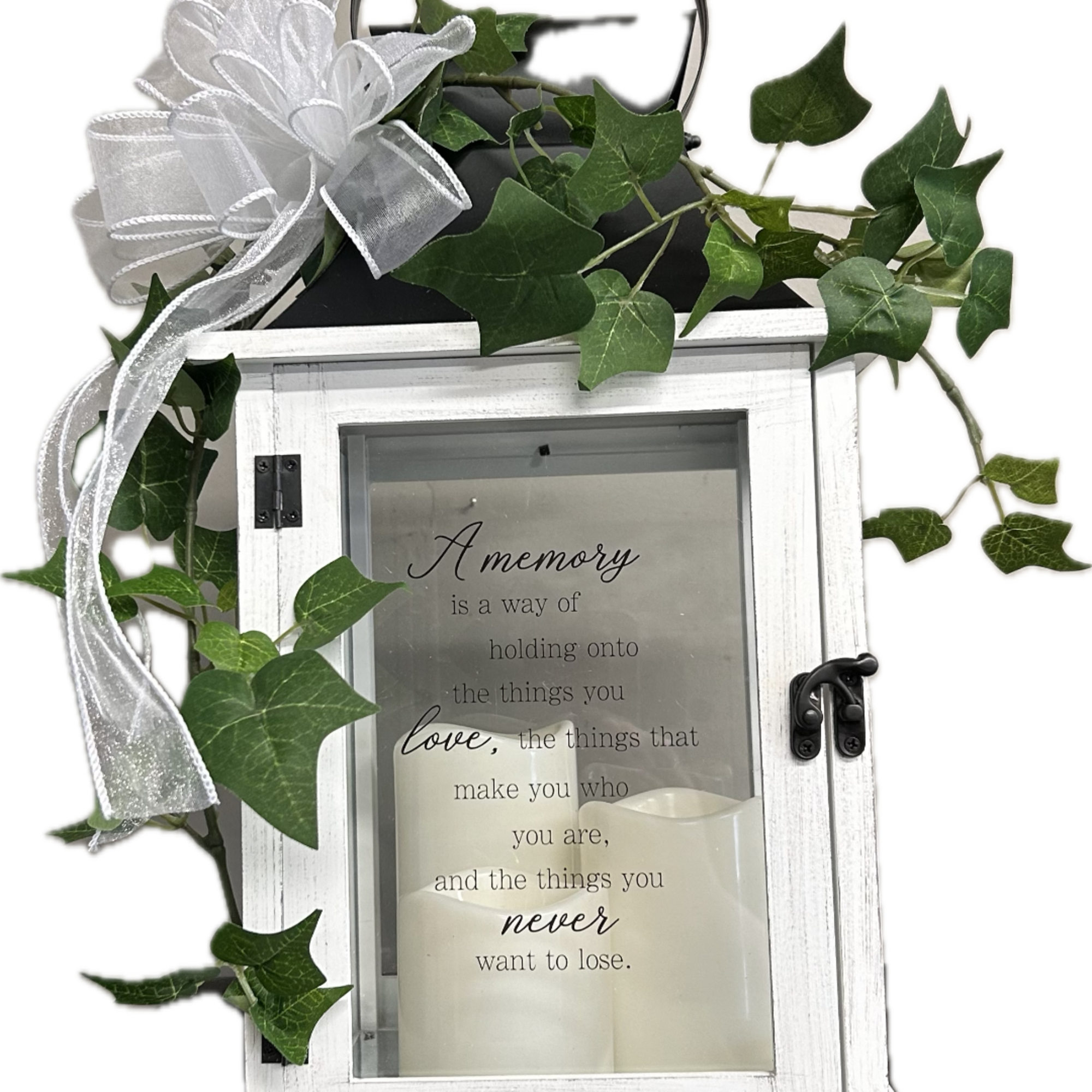 Wood with metal top lantern with an LED lighted candle.  Ivy