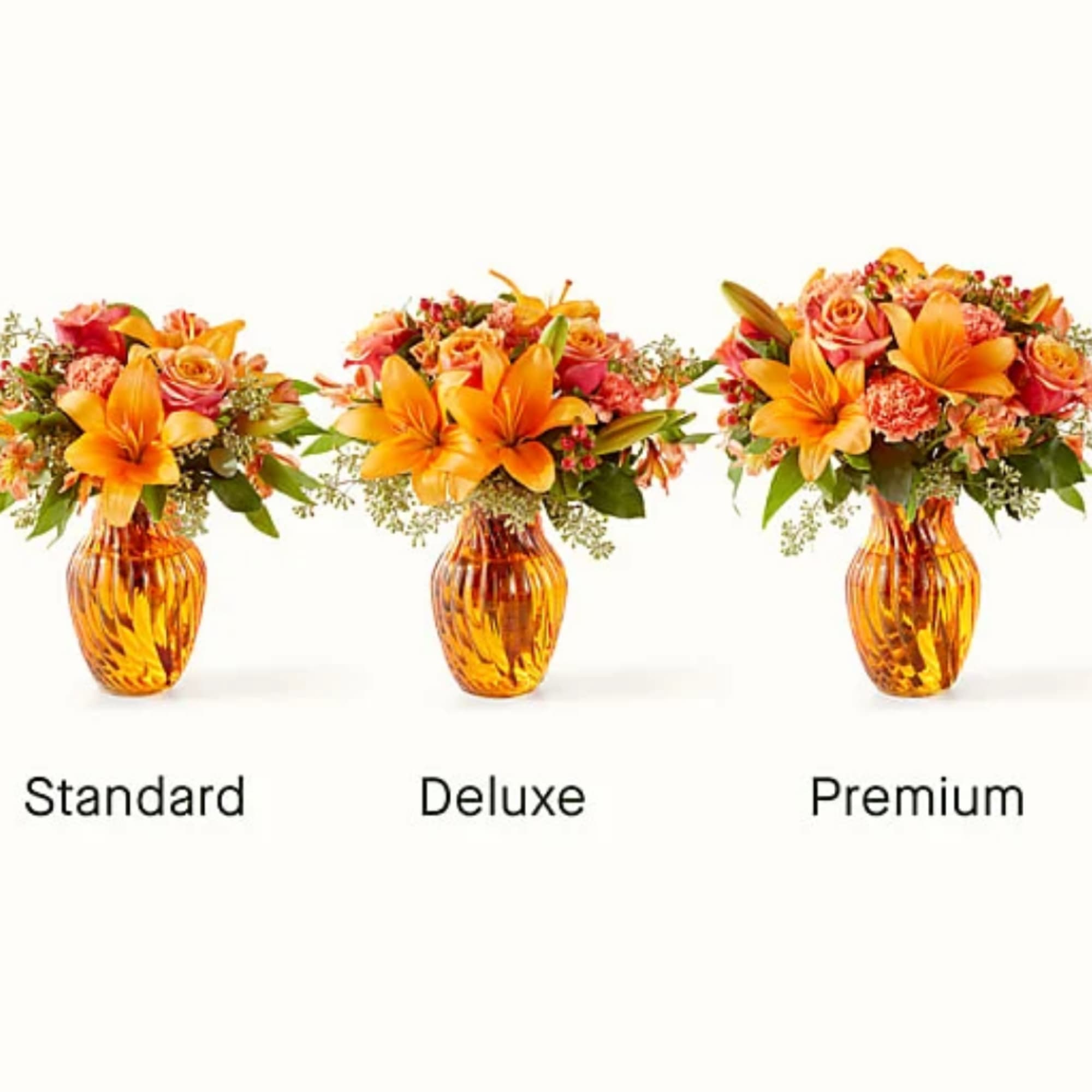 Three orange floral arrangements in amber vases labeled Standard, Deluxe, and Premium.