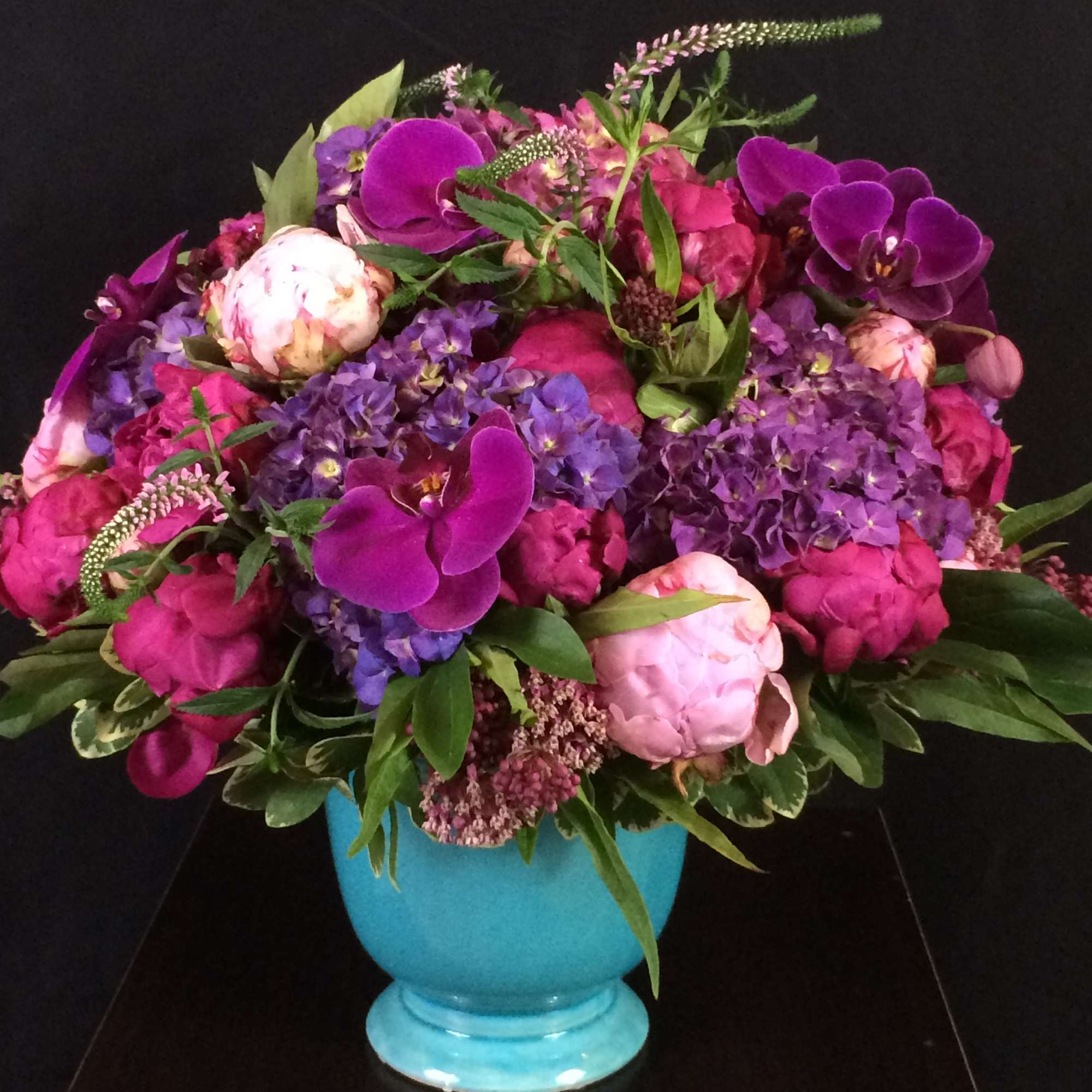 A beautiful and dramatic floral arrangement guaranteed to steal the show! A, photo 17 of 18