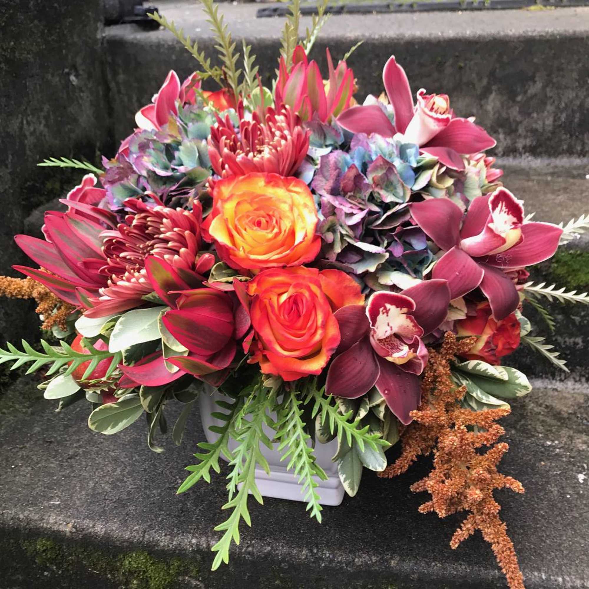 Scaled on the large size, this floral arrangement makes a big statement, photo 4 of 14