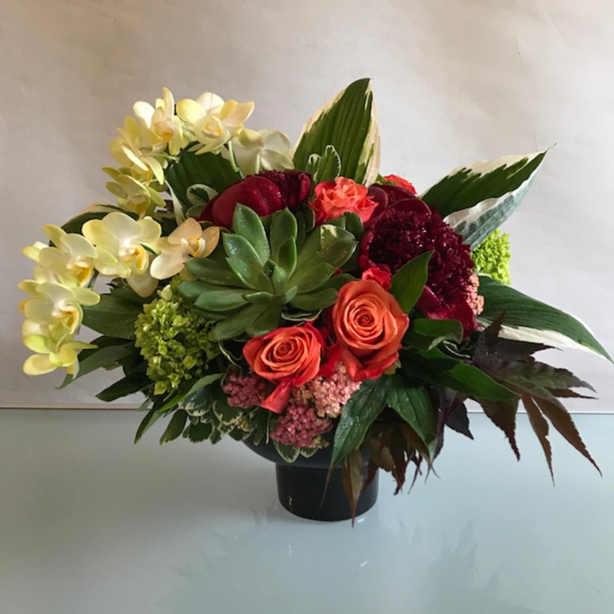 A beautiful and dramatic floral arrangement guaranteed to steal the show! A, photo 12 of 18