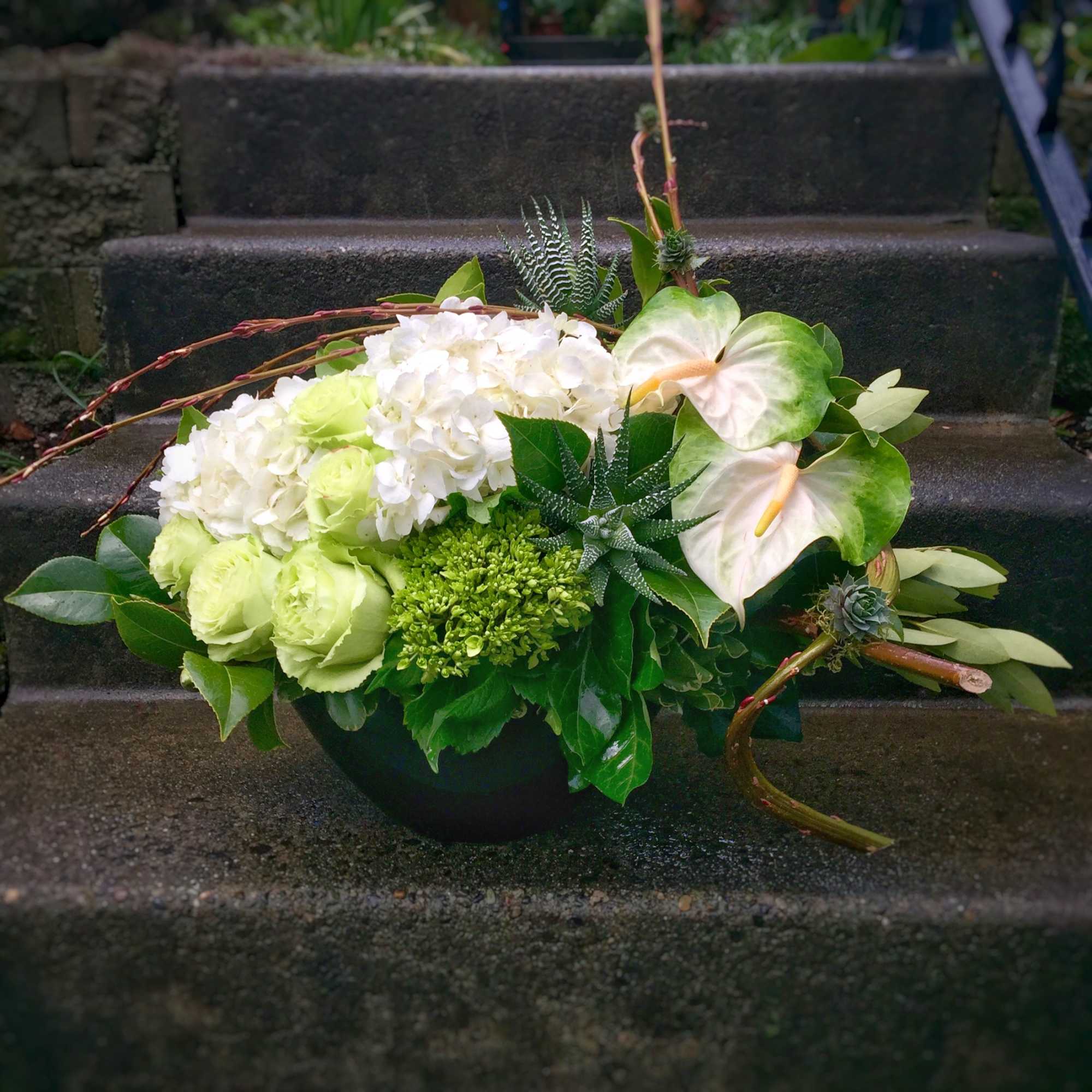 A beautiful and dramatic floral arrangement guaranteed to steal the show! A, photo 11 of 18