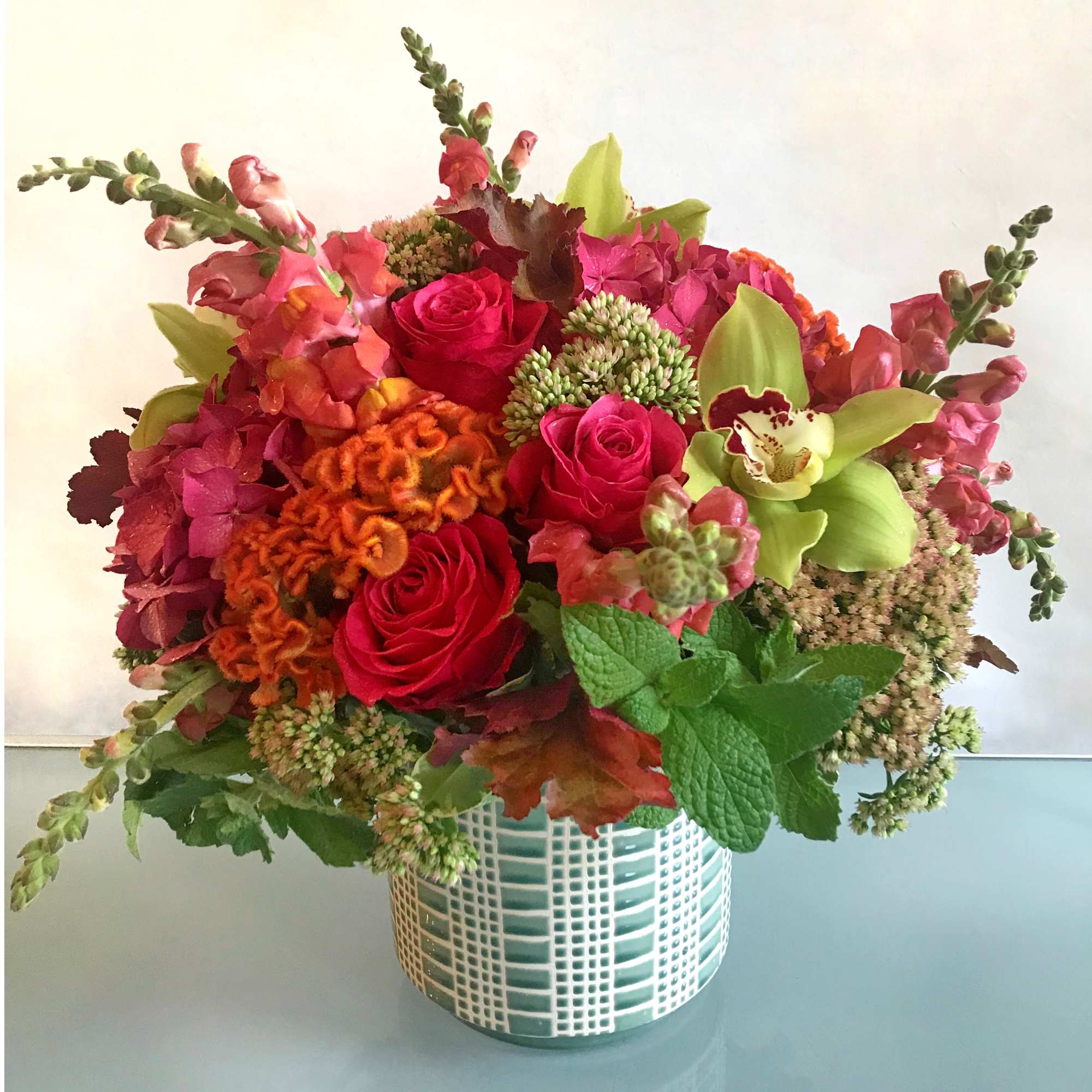 Scaled on the large size, this floral arrangement makes a big statement, photo 10 of 14