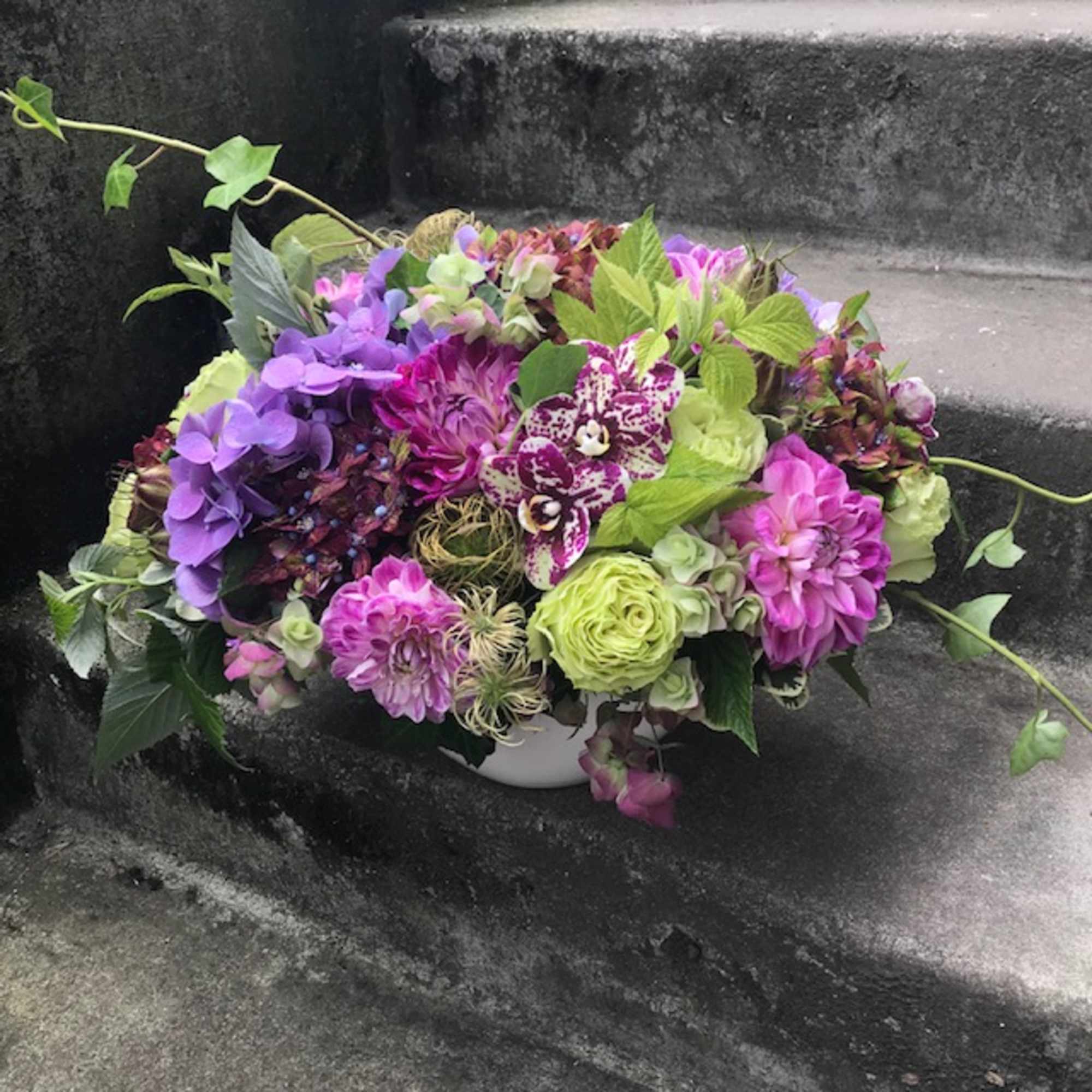 Scaled on the large size, this floral arrangement makes a big statement, photo 2 of 14