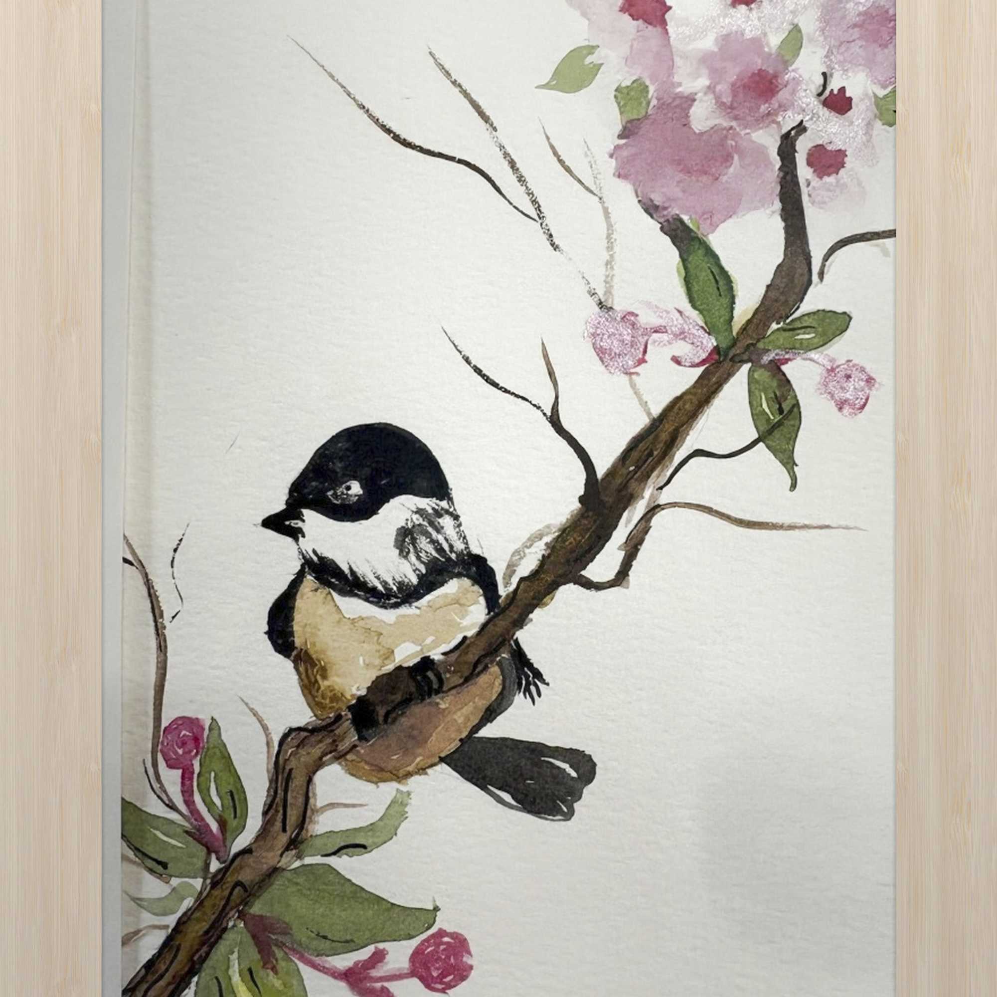 Framed watercolor of a bird on a flowering branch