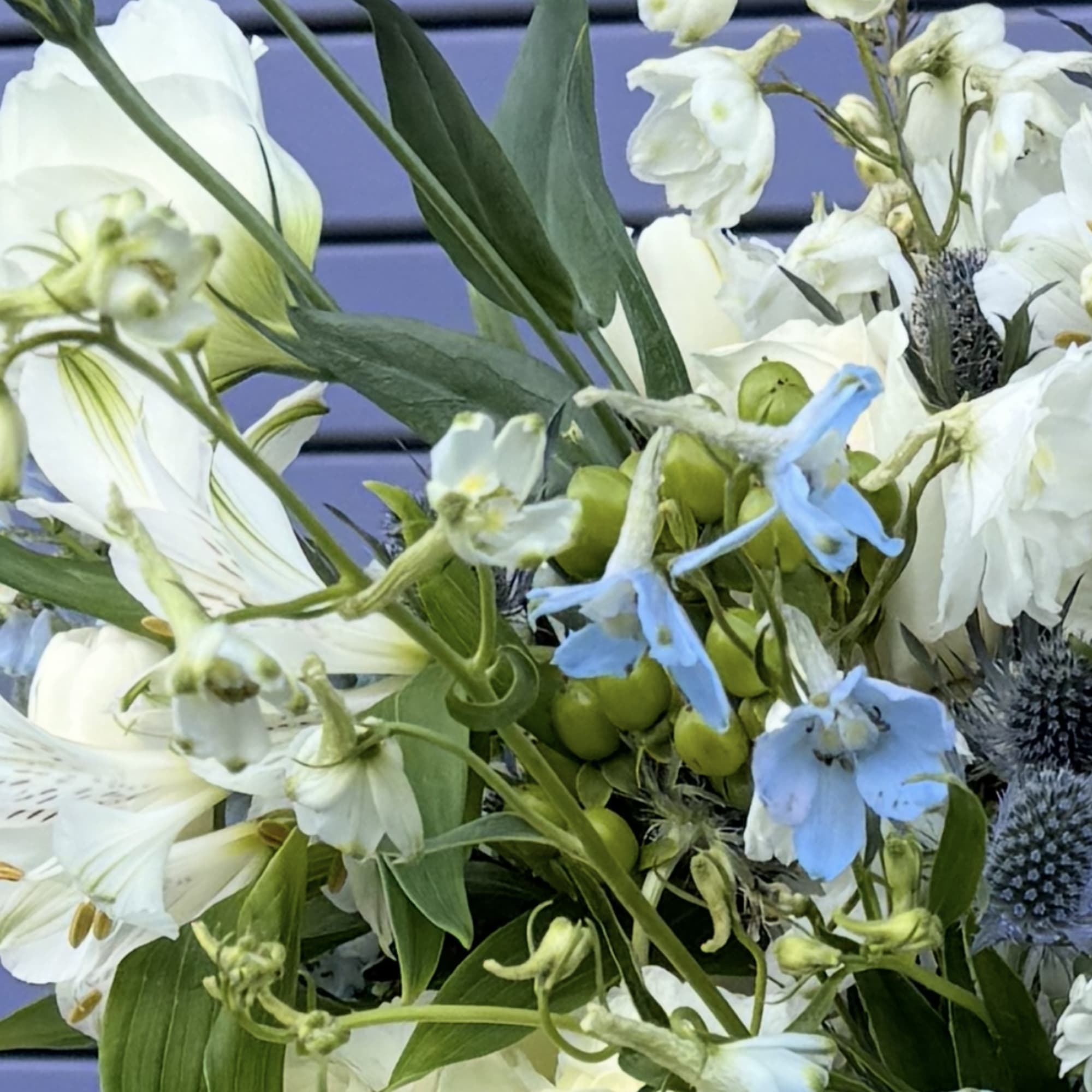 White and blue mixed bouquet with lilies and hydrangea