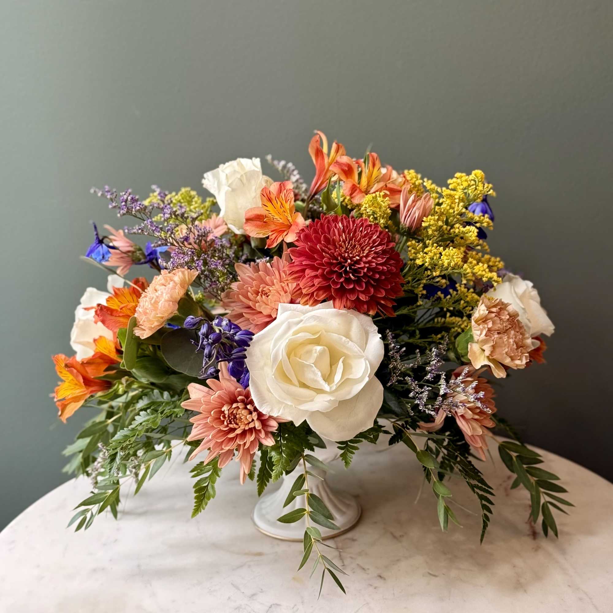 A soft, sophisticated fall floral design for moments that deserve a touch