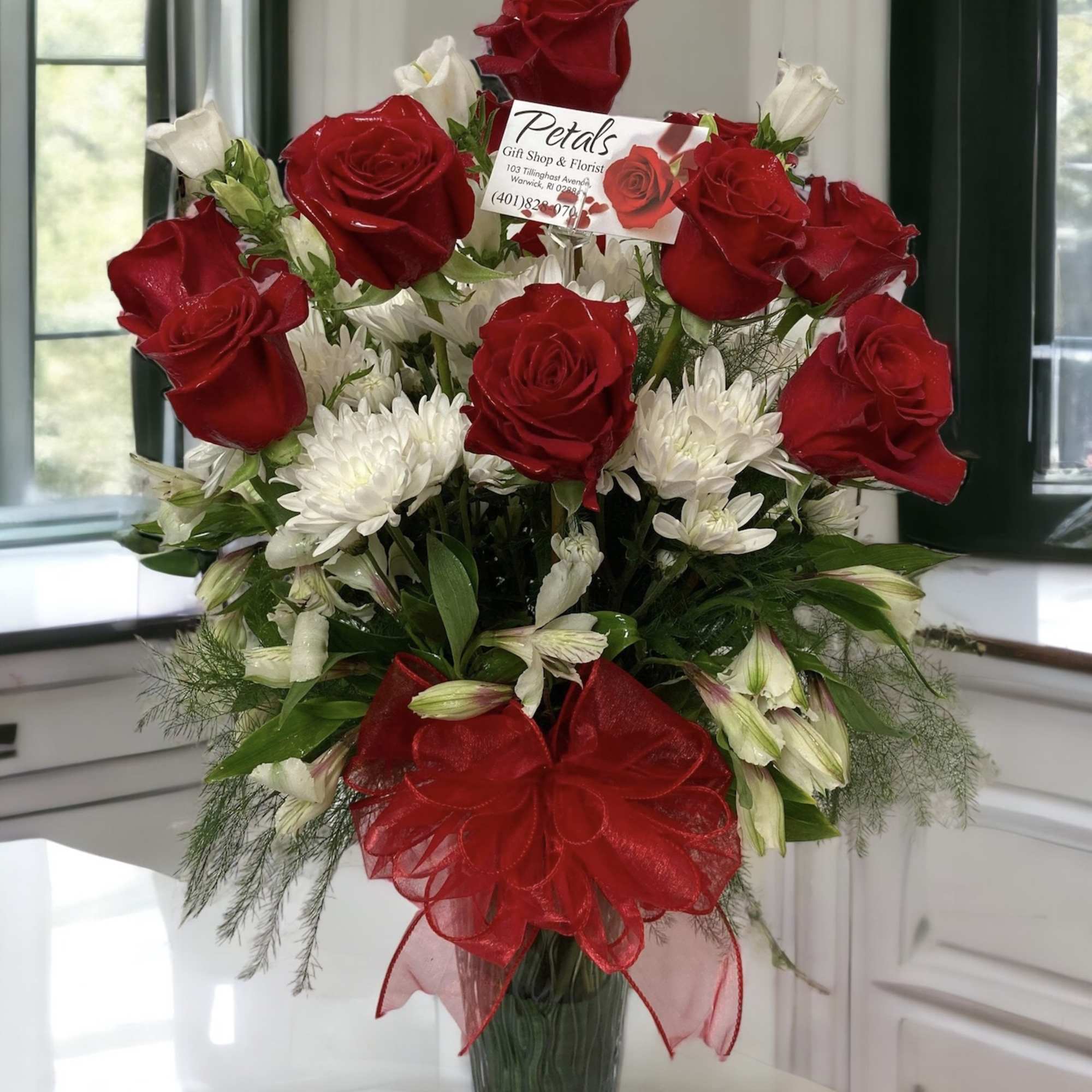 A dozen red roses isn't just a gift; it's a timeless declaration, photo 2 of 3