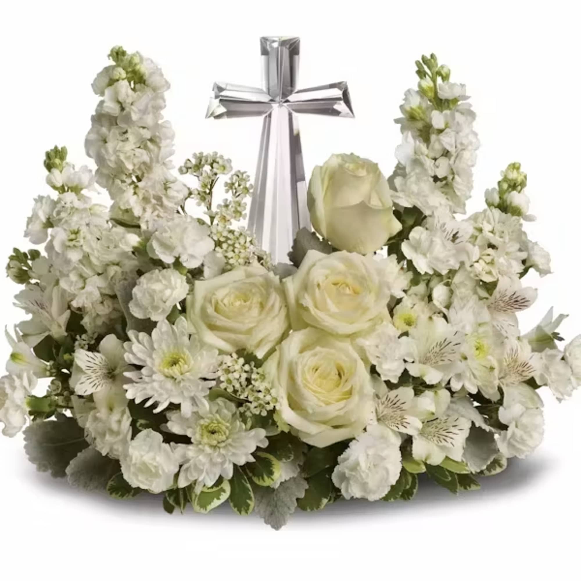 White floral arrangement with a silver cross centerpiece