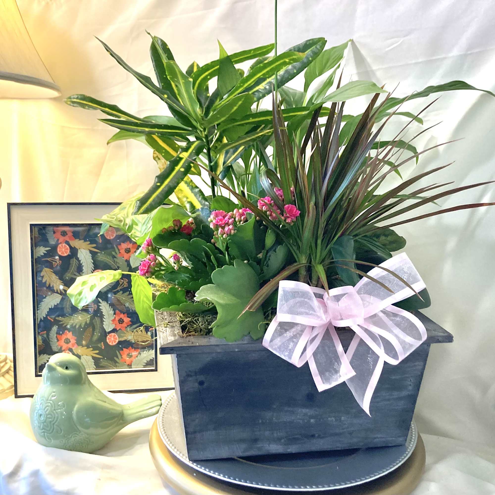 Send a little garden to somebody. A mix of flowering plants and