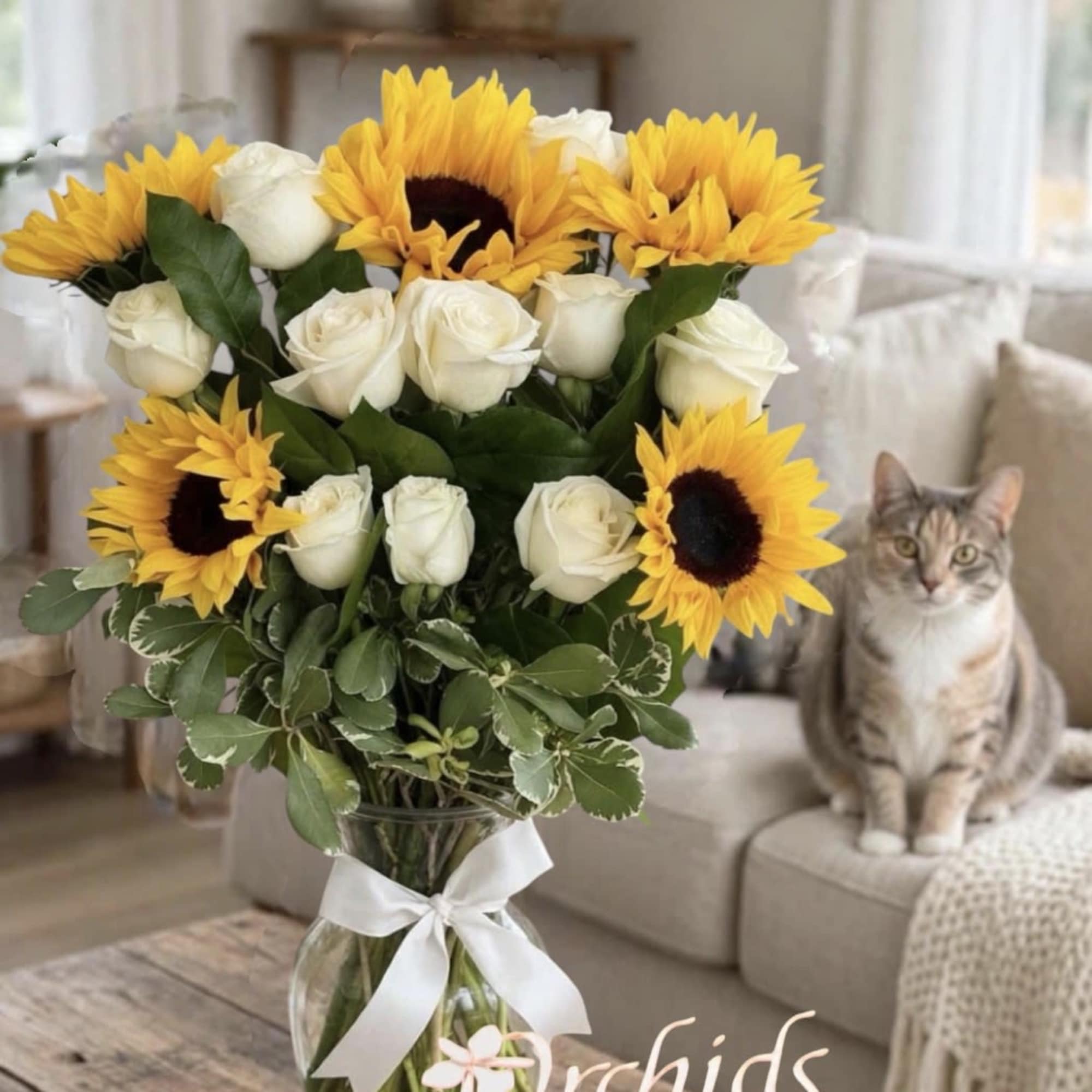Brighten someone's day with our elegant Sunflower &amp; White Rose Bouquet, featuring
