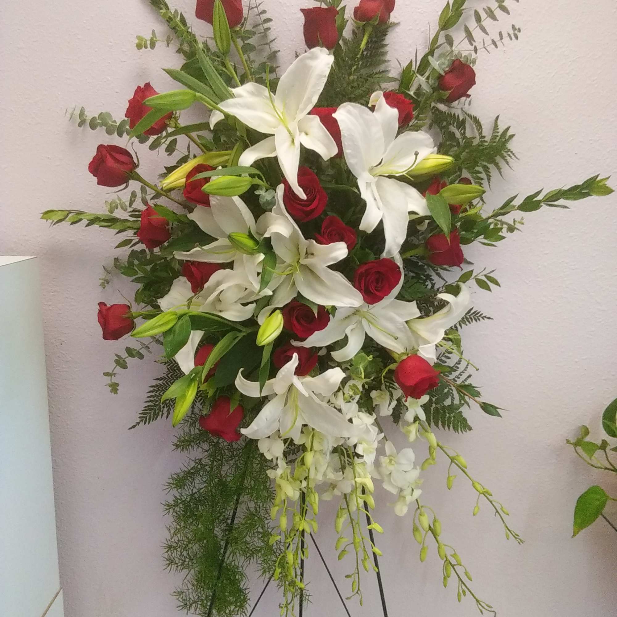 Standing floral spray with red roses and white lilies