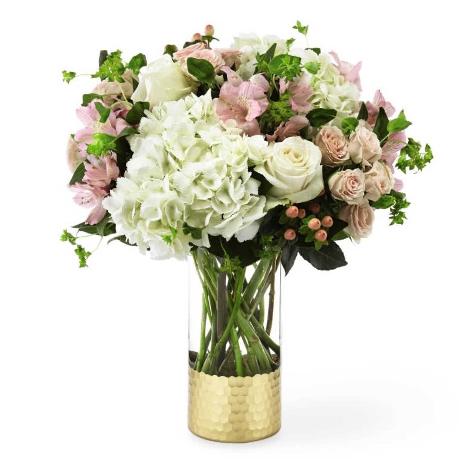 Pink and white mixed bouquet in a clear glass vase with a gold base