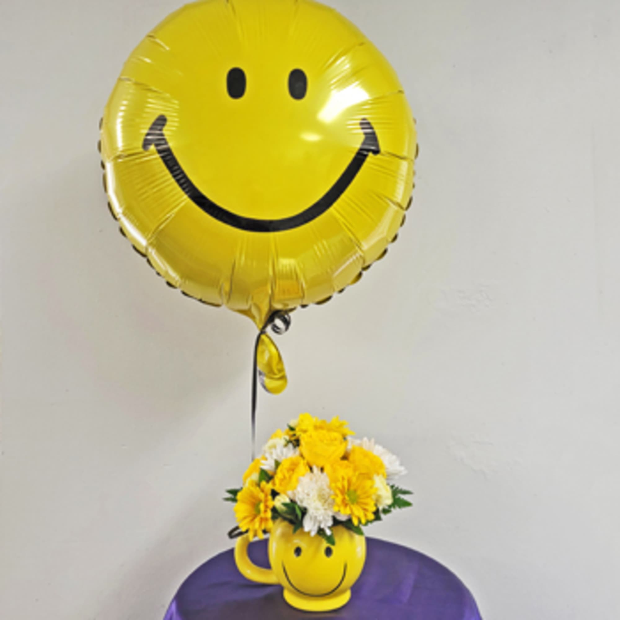 Everybody needs to be HAPPY!!  And this ceramic smiley face mug