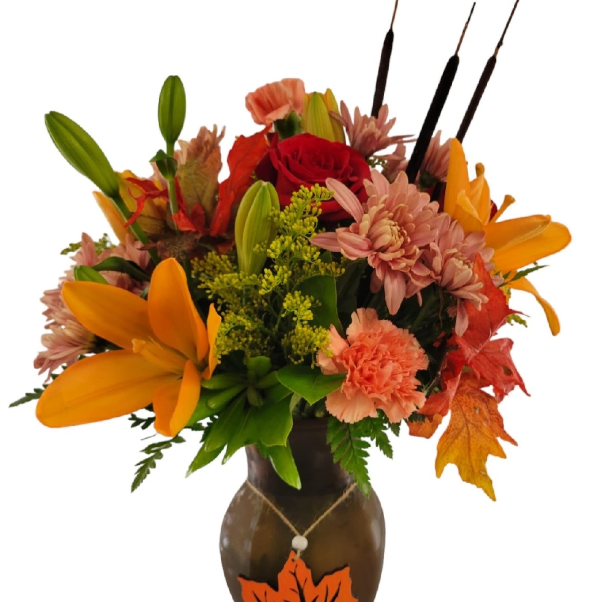 Autumn bouquet with lilies, roses, and mums in a brown vase