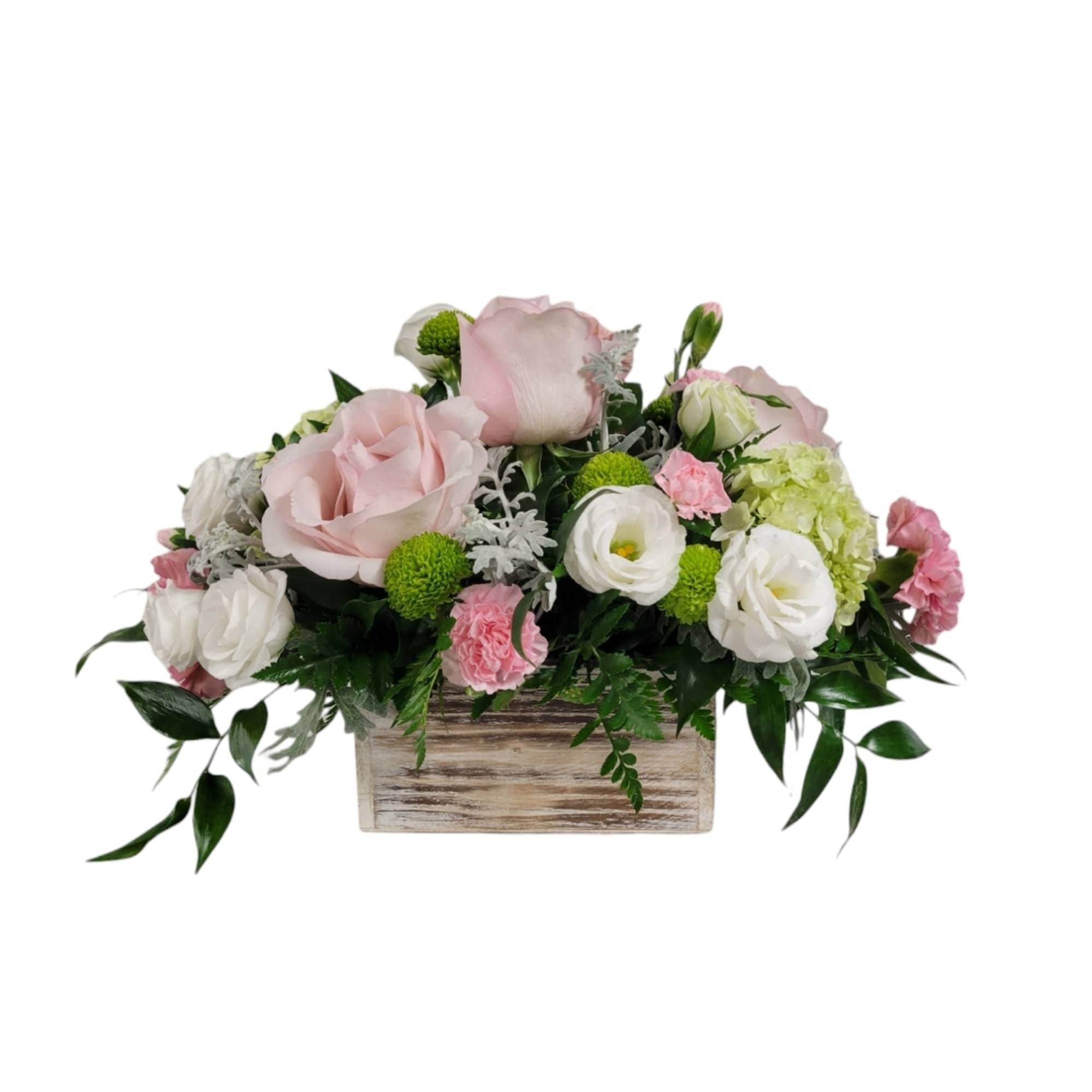 Pink and white floral arrangement in a wooden box