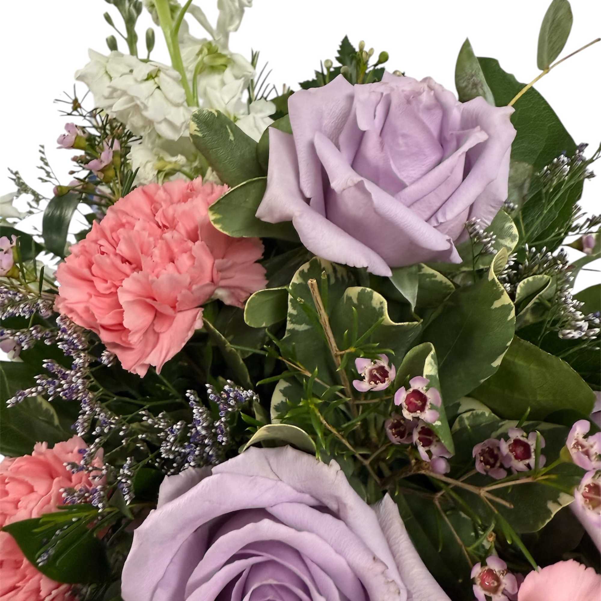Bouquet of lavender roses and pink carnations with white blooms