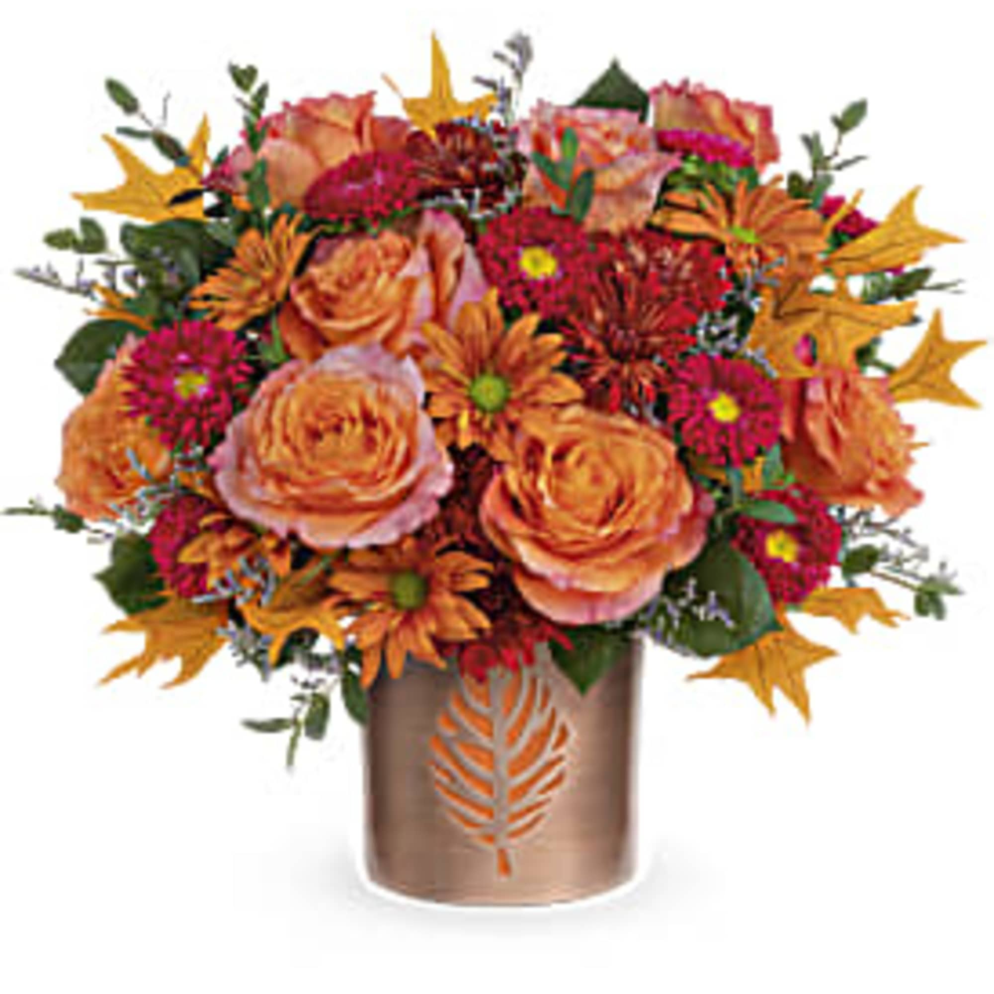 Orange and magenta floral arrangement in a bronze vase