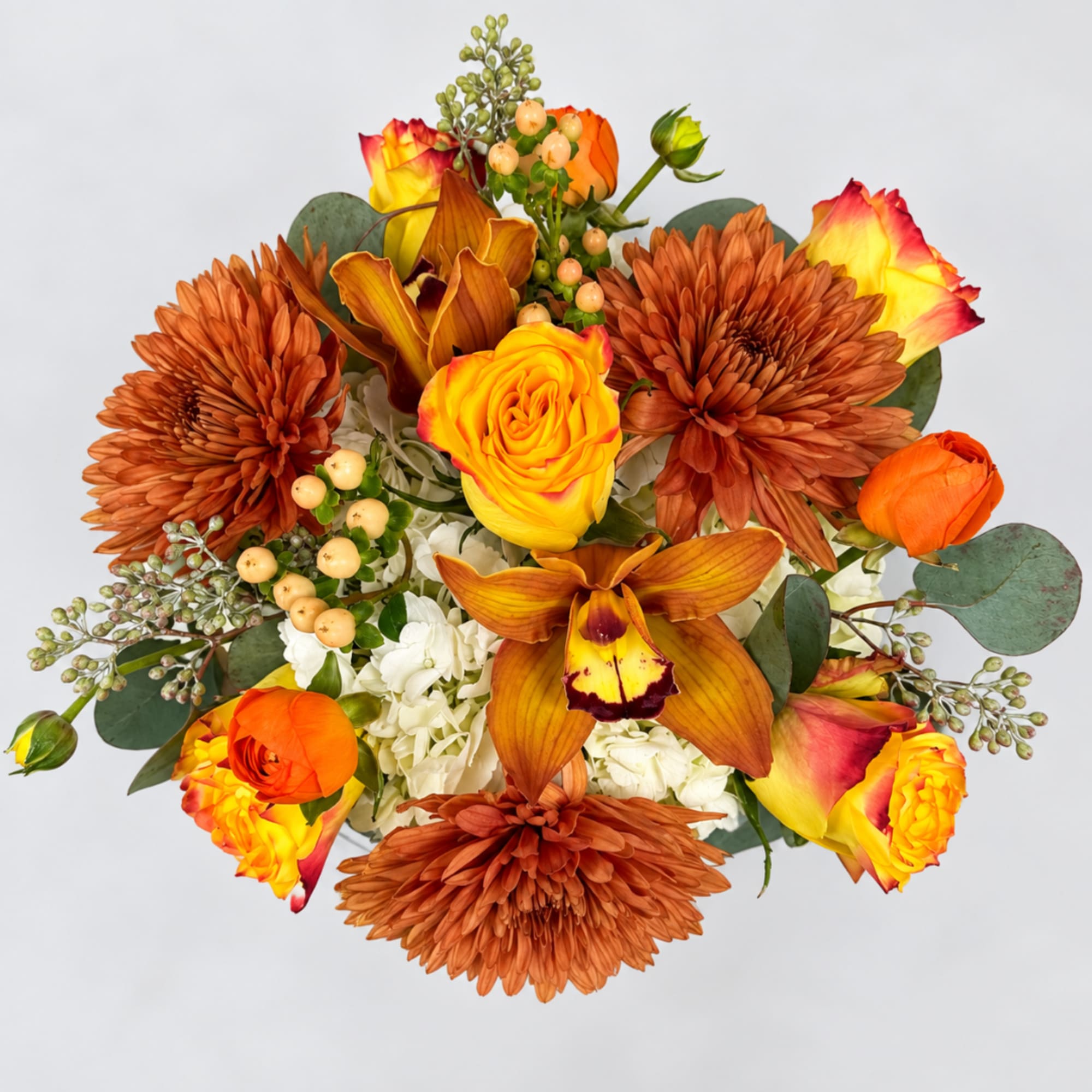 Bouquet of orange and yellow roses with bronze chrysanthemums