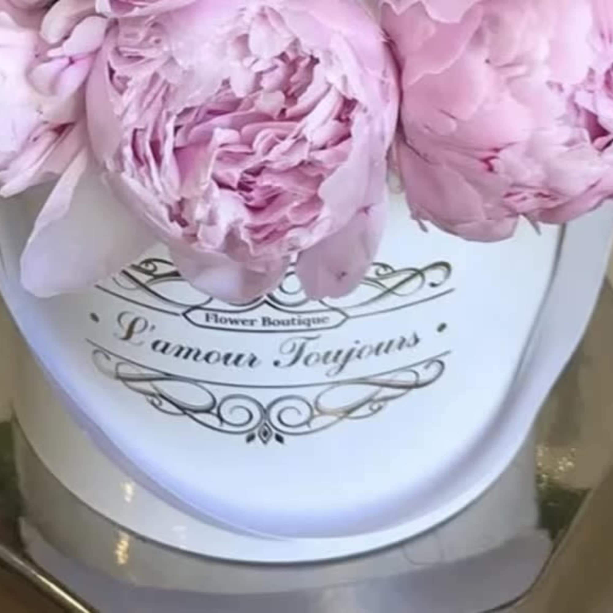 Pink peonies arranged in a white hat box, photo 3 of 4