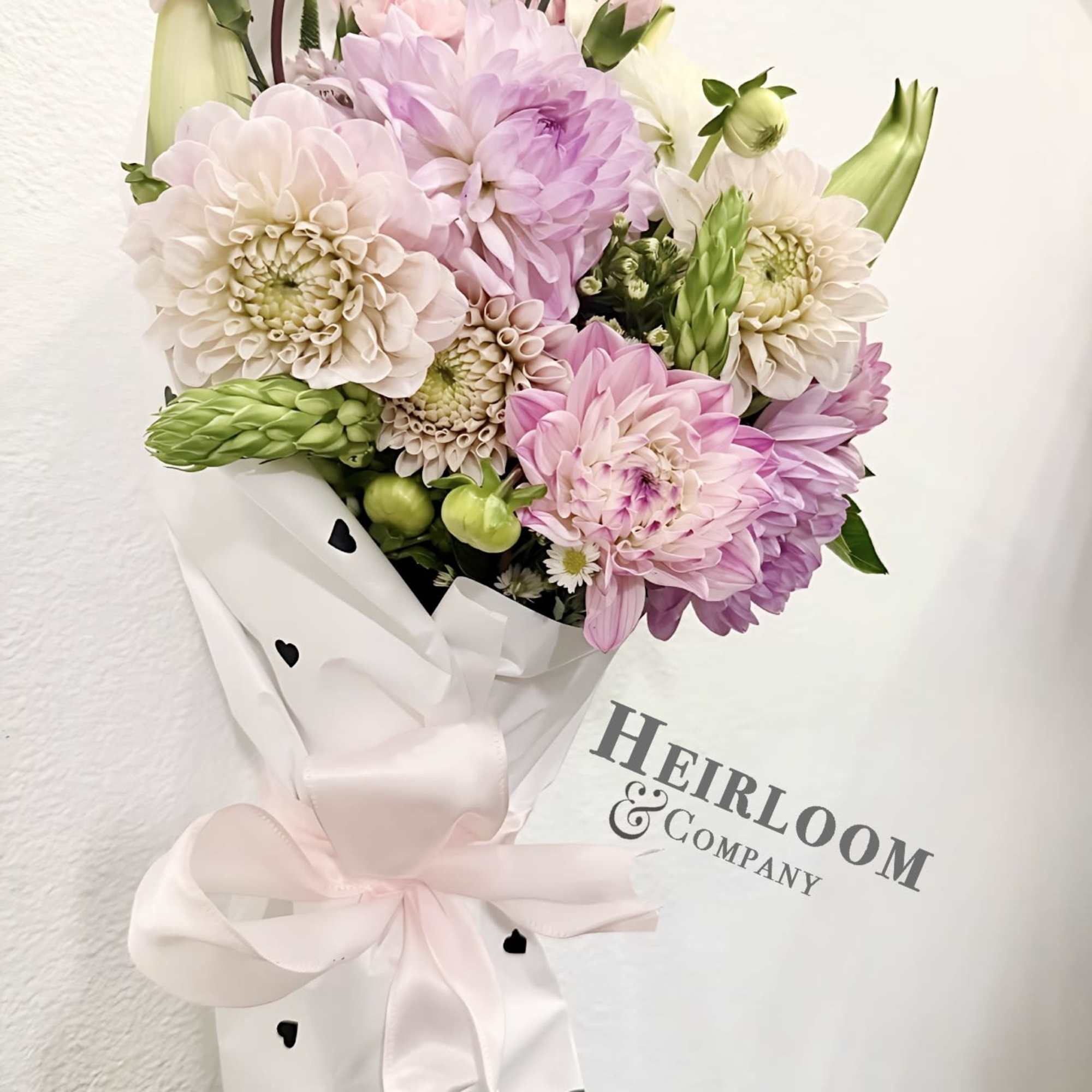 Our Bouquet of the Week is a seasonal florist&rsquo;s choice arrangement featuring, photo 2 of 3